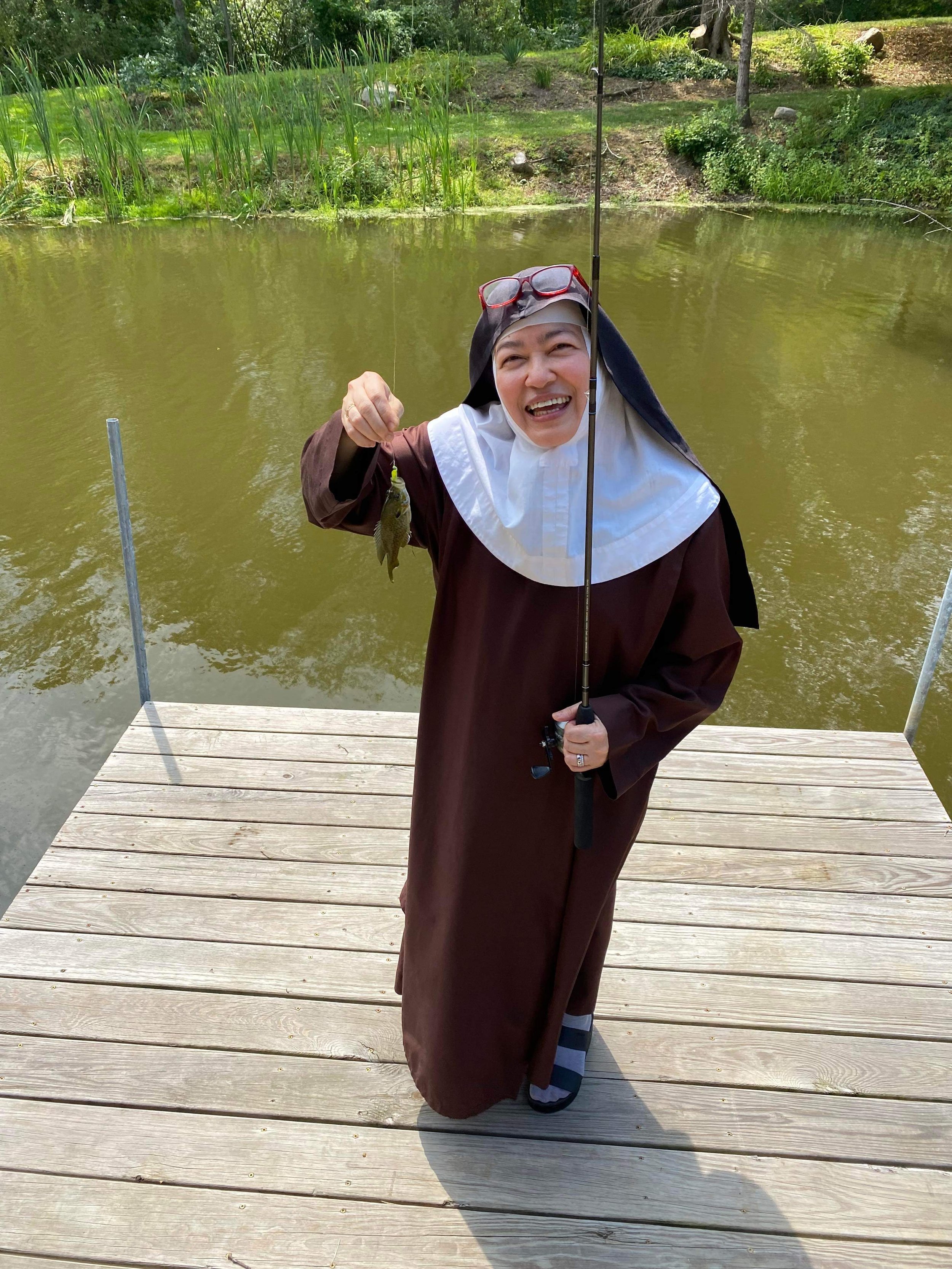 The infamous fish that Sr. Maria Teresina was so delighted to catch...only after this did we have the heart to tell her no fishing in our pond