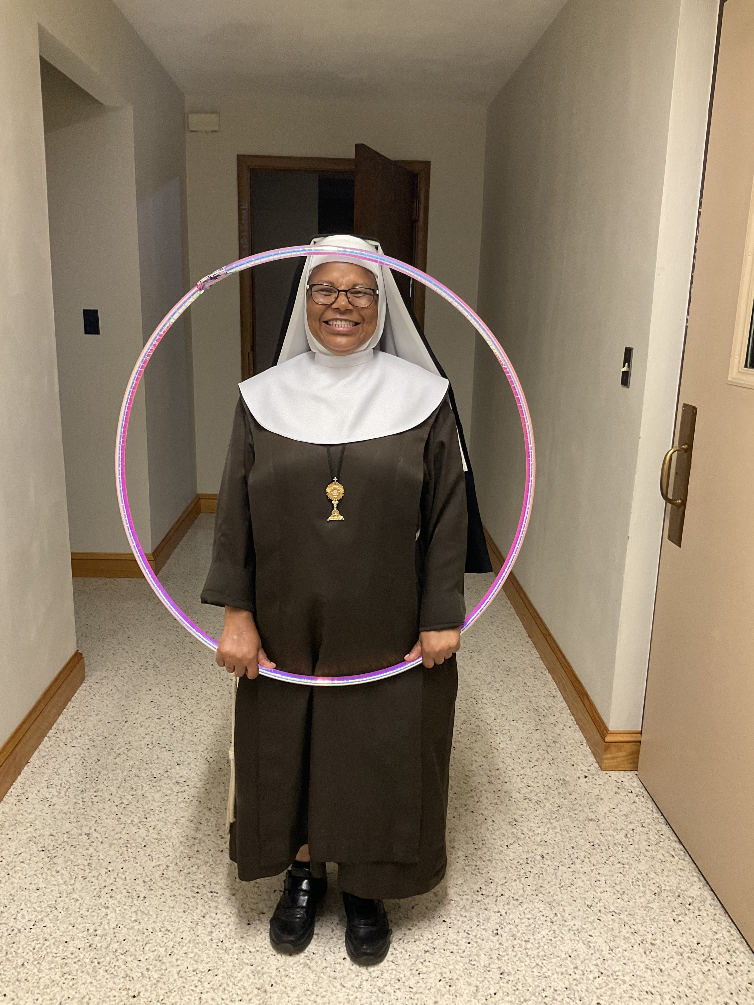 Sr. Mary Clare with the infamous hula hoop that we tried to get some Sisters to reenact their glory days with