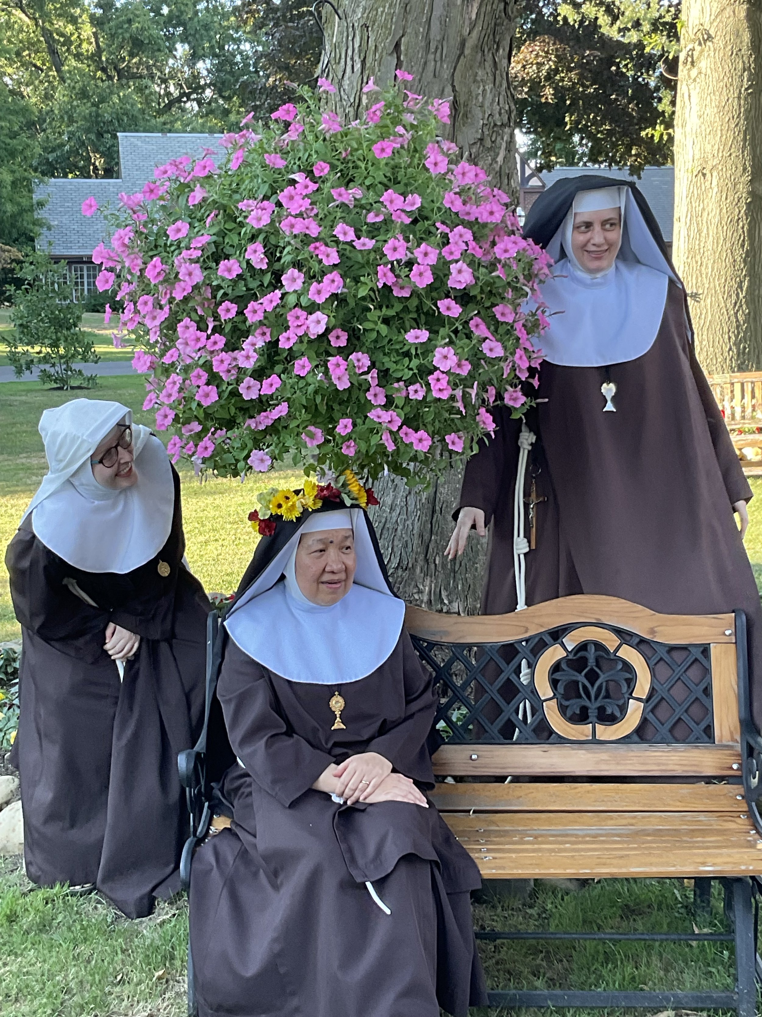 Sr. Thérèse Marie waiting to scare an unsuspecting Sr. Bridget Marie with Mother Mary Gertrude none the wiser