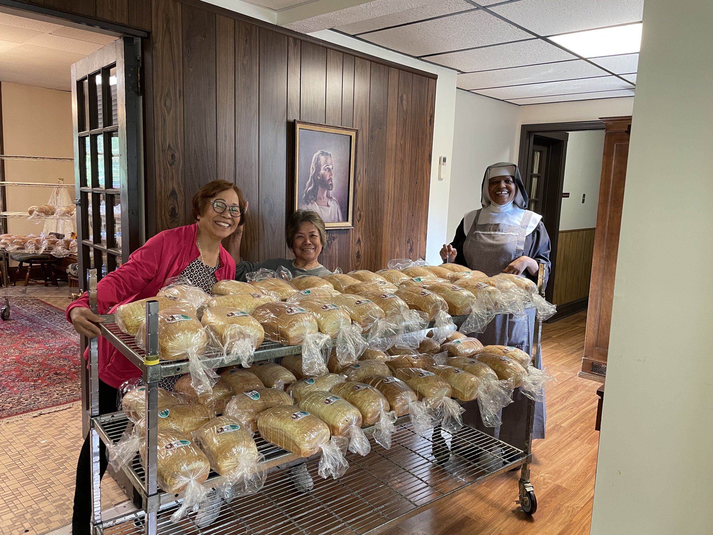  See they are multi-talented…Cora and Jeanie helping move the bread racks around our very tight corners. 