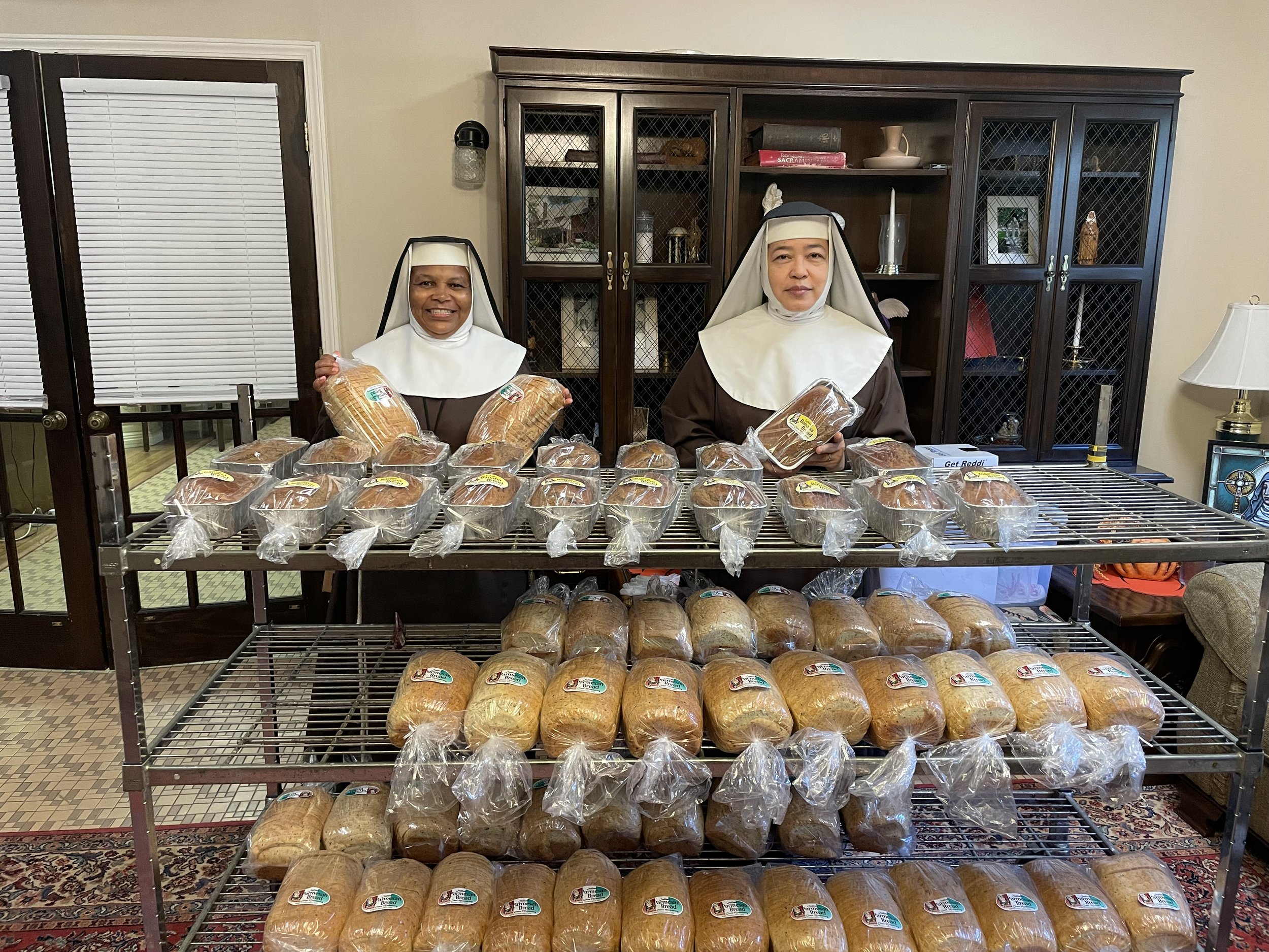  Sr. Mary Clare and Sr. Maria Teresina who are also part of the bread crew showing off the fruits of their labor…again no 2 AM wake up call for this Sister to take actual bread making pictures. 