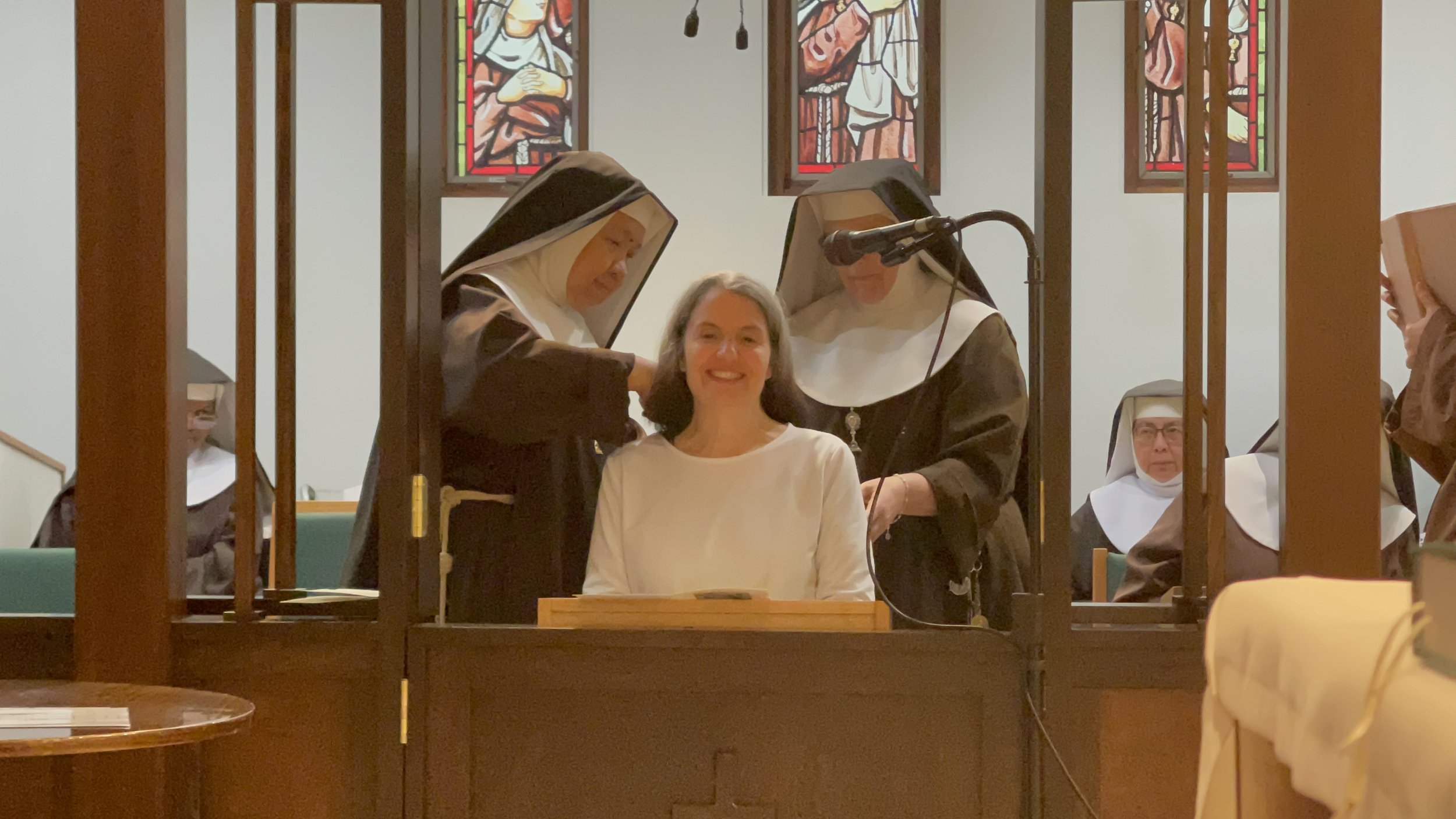 The cutting of the hair before being invested in our Holy Habit goes back to St. Francis cutting St. Clare’s hair as a sign that she is belongs to God and the religious life.