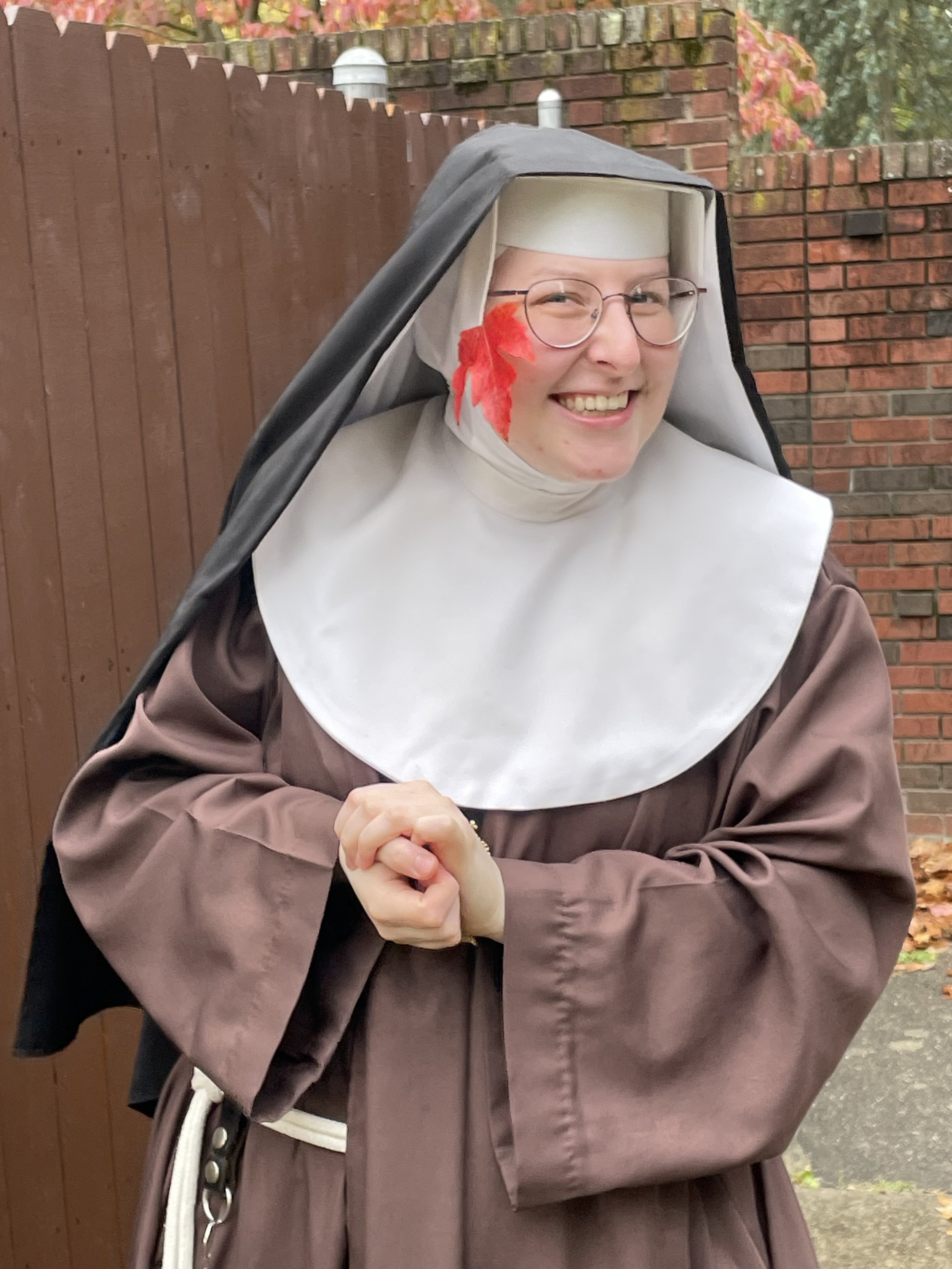 So we had to update Sr. Thérèse Marie's picture and here she is trying to convince me this leaf is a Hawaiian flower. It didn't go over too well.