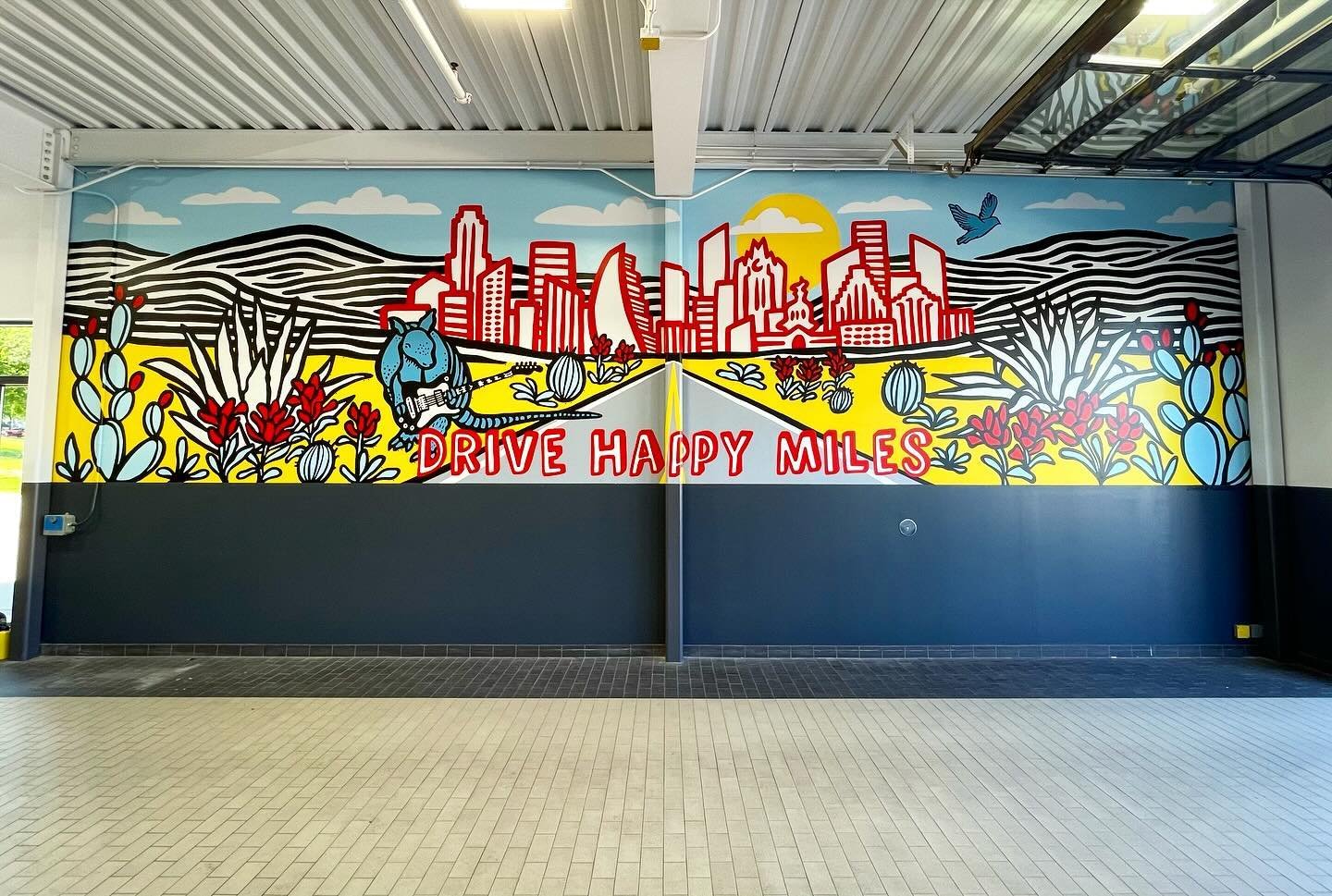 New mural at @citylimitsnissan! It was a complete joy painting this one. Thank you all so much for having us out to brighten up your service center.
&bull;
🎨&amp;🕺assist: @devinwatlington and @lizafishbone
&bull;
#allthehashtags #mural #murals #wal
