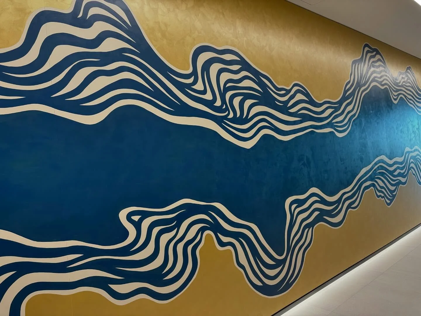 Finally posting this fantastic hallway mural that I painted a month (or two?) ago for the new Kirkland &amp; Ellis office space in downtown Austin. I really loved how this abstract depiction of the Barton Springs outlet turned out.

Thank you @follis