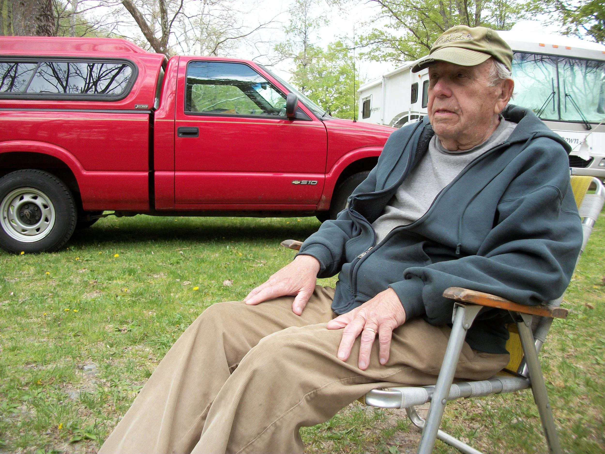 Dick lounging in front of the party camper.