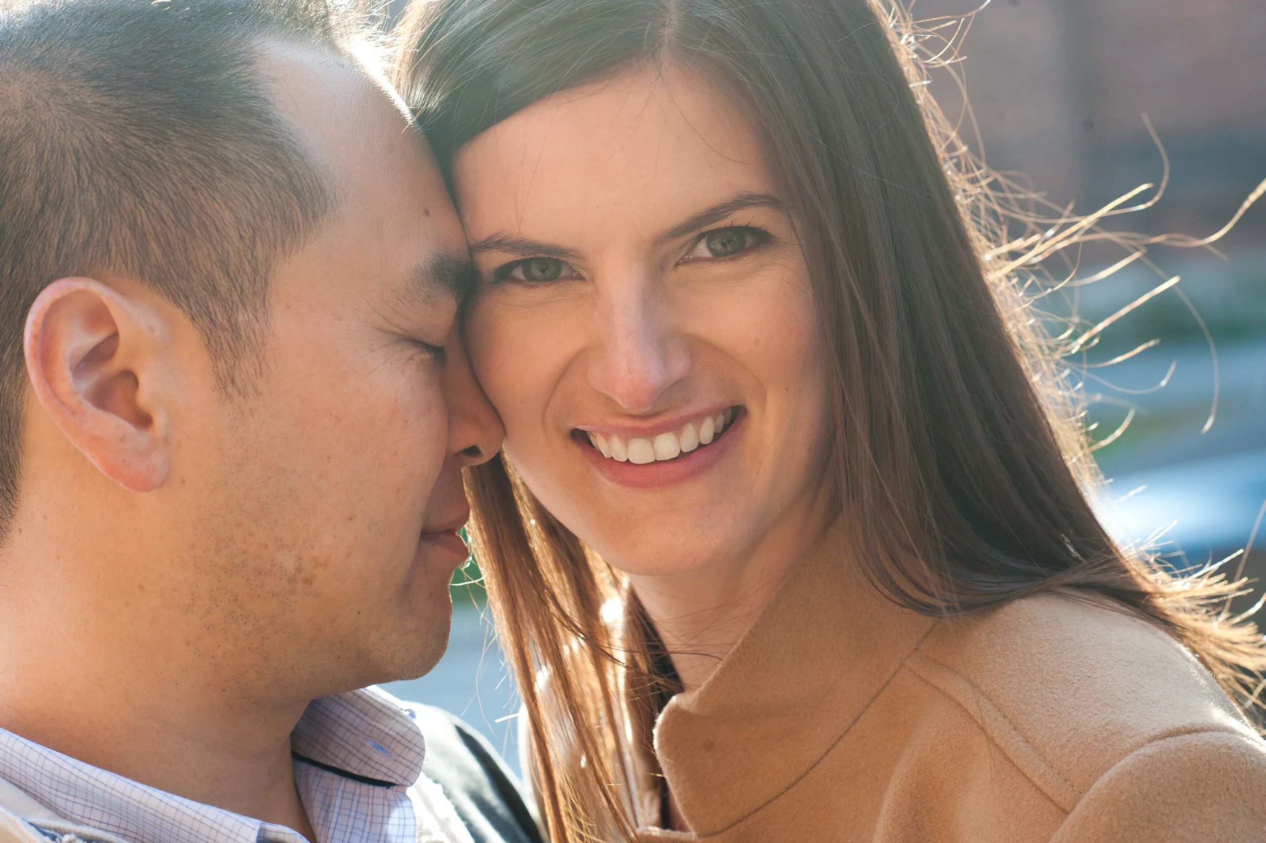 An sunlit engagement photograph from Christa + Jeff's downtown Toronto engagement session by Toronto wedding photographer Scott Williams. Christa and Jeff had their outdoor wedding ceremony and reception at Graydon Hall Manor in Toronto, Ontario. 