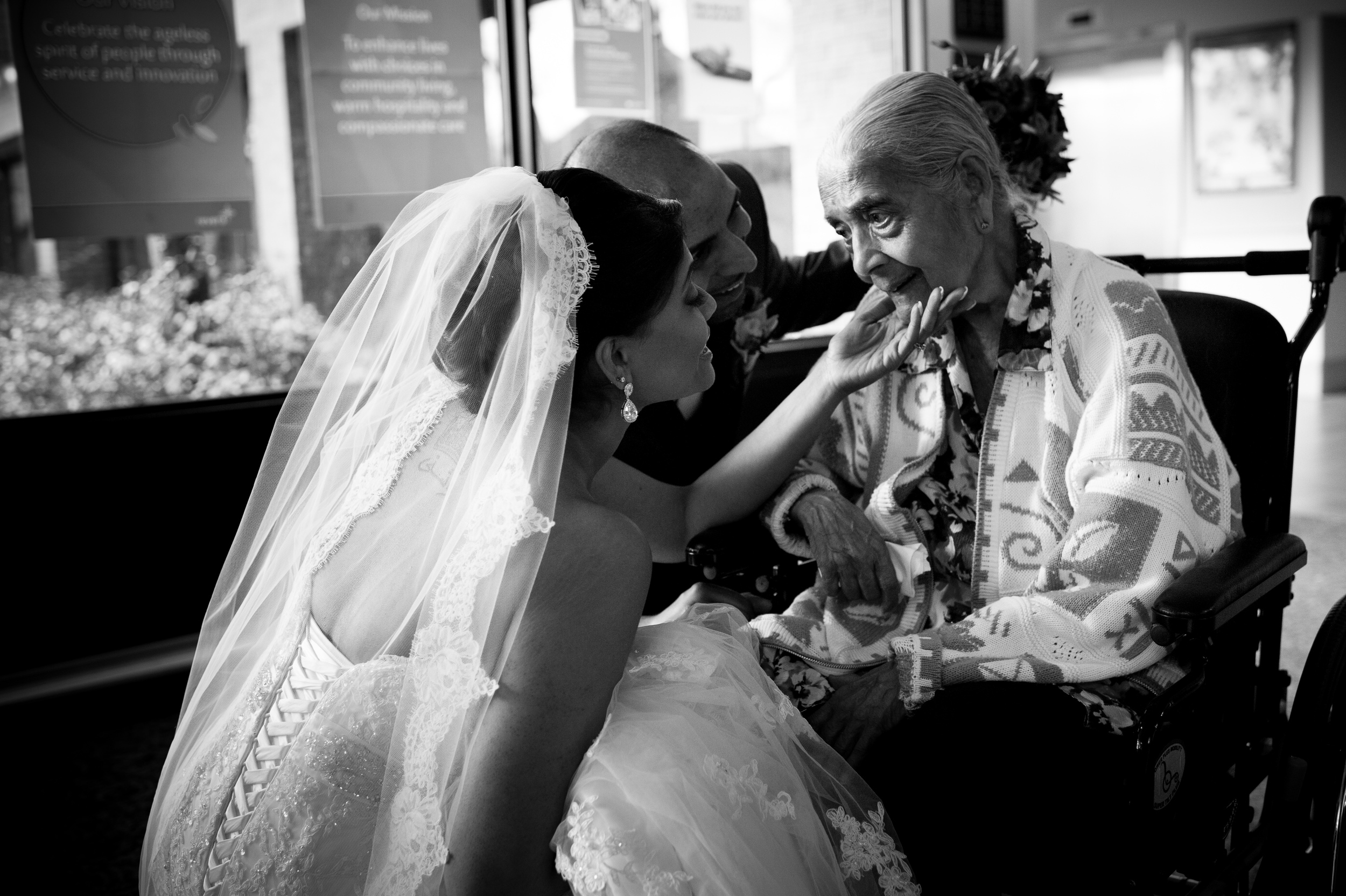  A bride visit's her grandmother in the nursing home immediately after her wedding ceremony. 