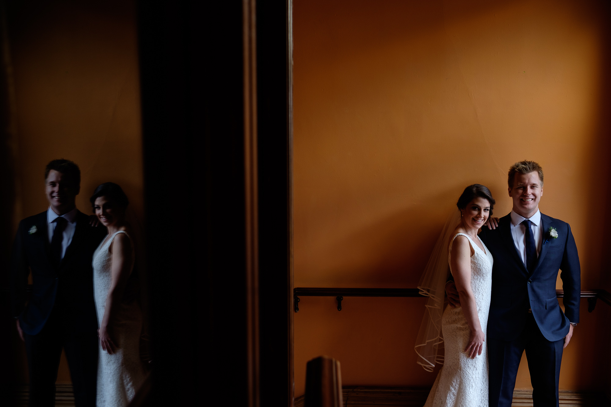 Emilie and John pose for a wedding portrait at the Gladstone Hotel.