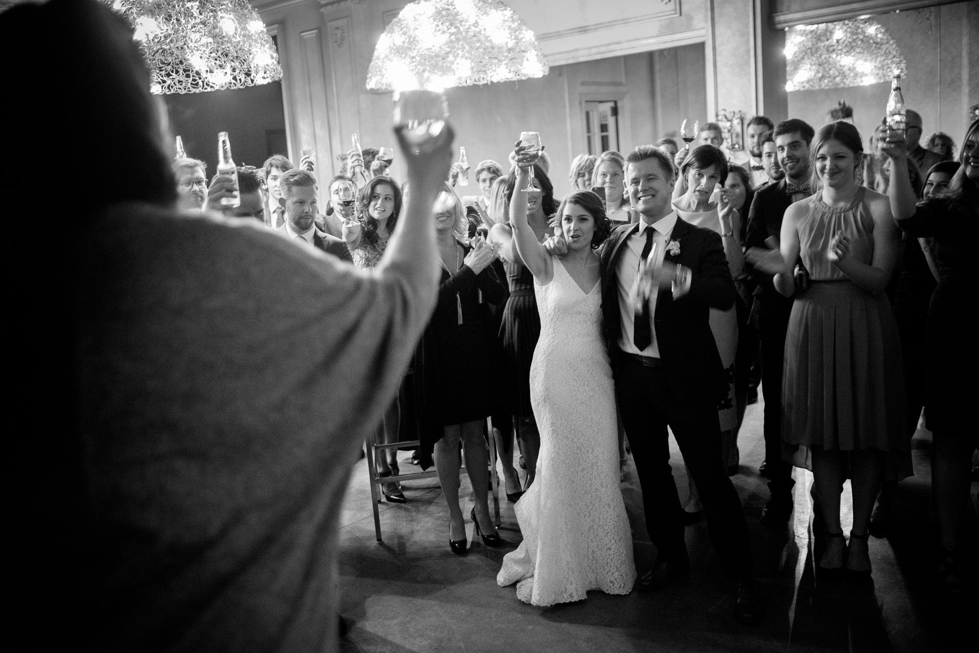  The master of ceremonies toasts the newlywed couple during the cocktail hour at their wedding in 99 Sudbury. 