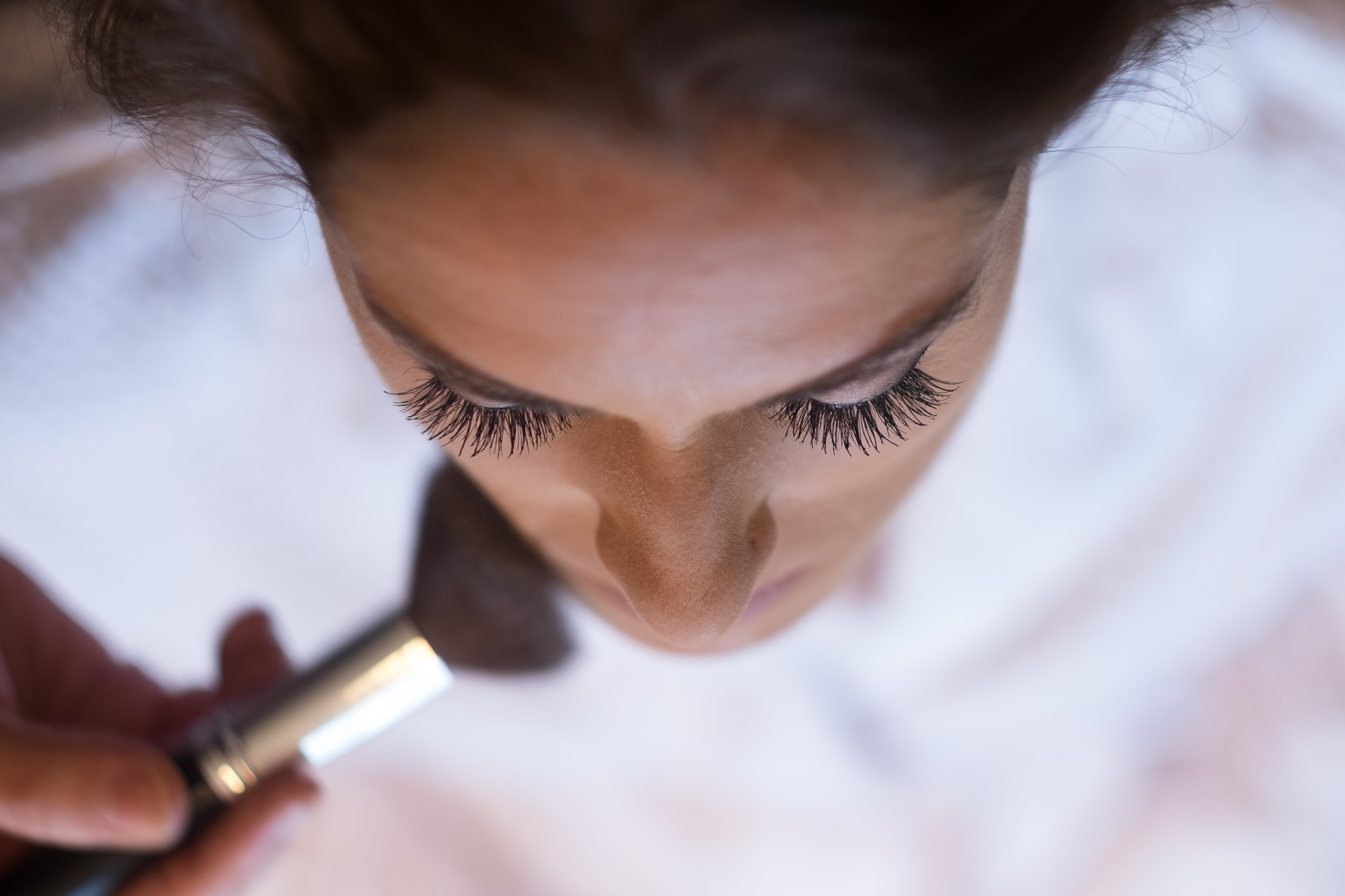 Rebecca has her makeup applied before her wedding ceremony at the Hessenland Inn near Grand Bend, Ontario.