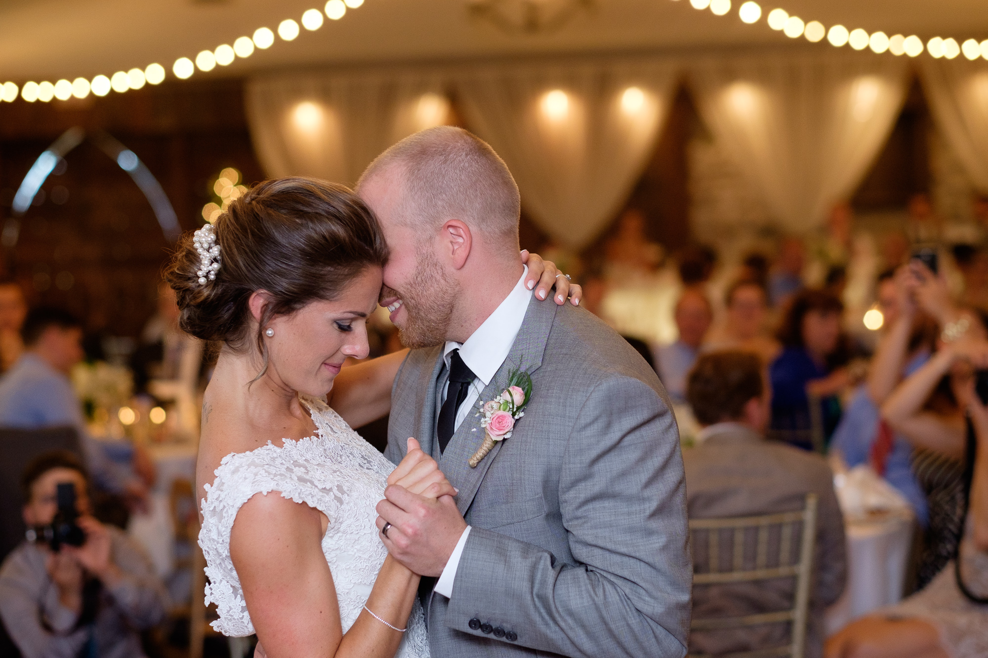 A photograph of the first dance during the reception from Rebecca + Jeff's wedding at the Hessenland Inn.