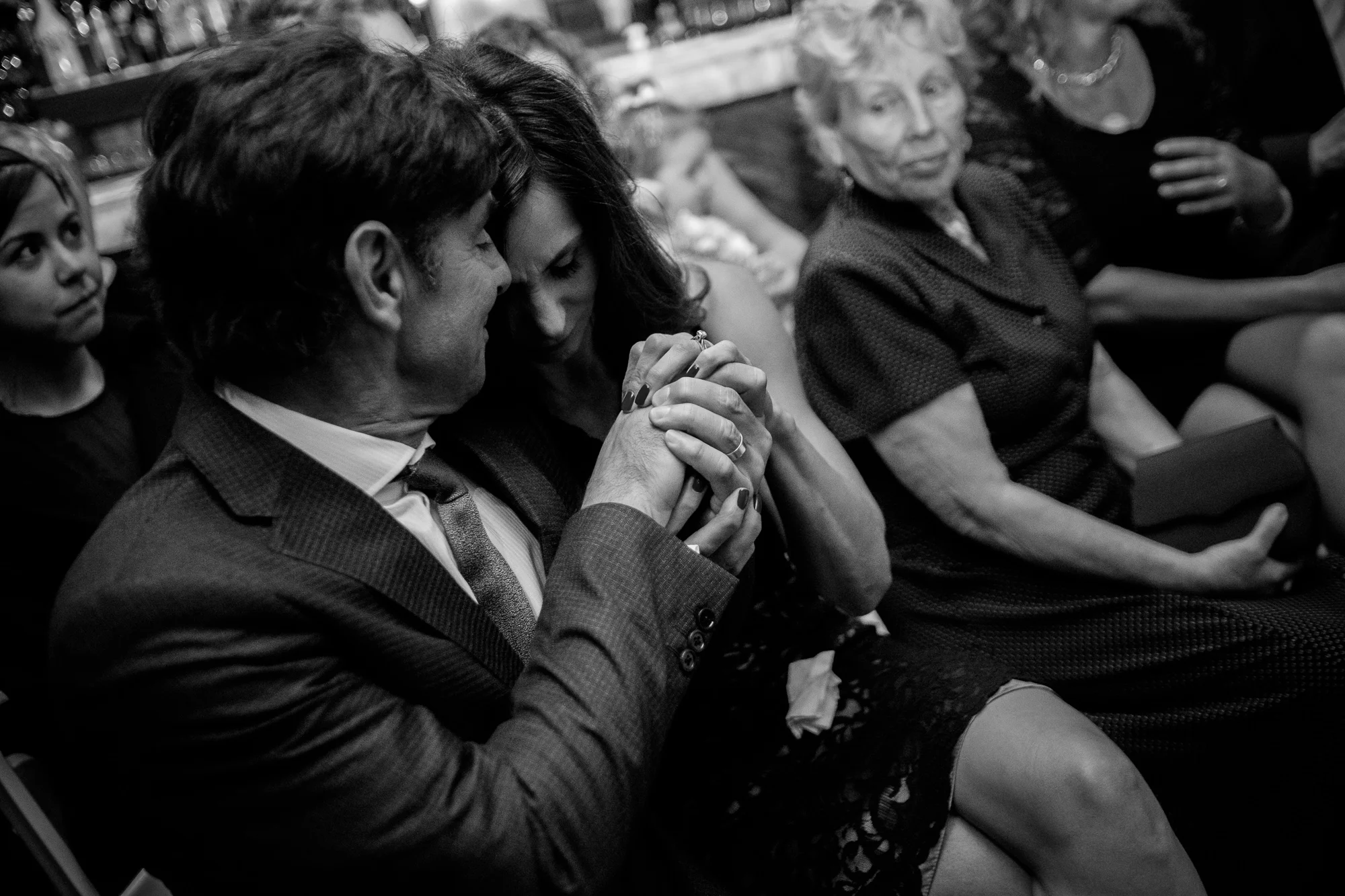 I really like this photograph from Spencer + Jonas' wedding at the Stirling Room in Toronto's Distillery District. During the wedding ceremony, they had something called a 'ring warming' where the two wedding rings were passed around to all the guests before they said their vows. Having shot over 300 weddings, it was nice to see something new and unique!