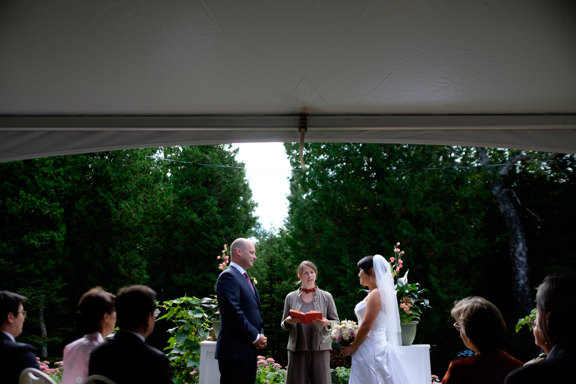  Joohee + Joel are married during their outdoor ceremony at a private residence in Tobermory. 