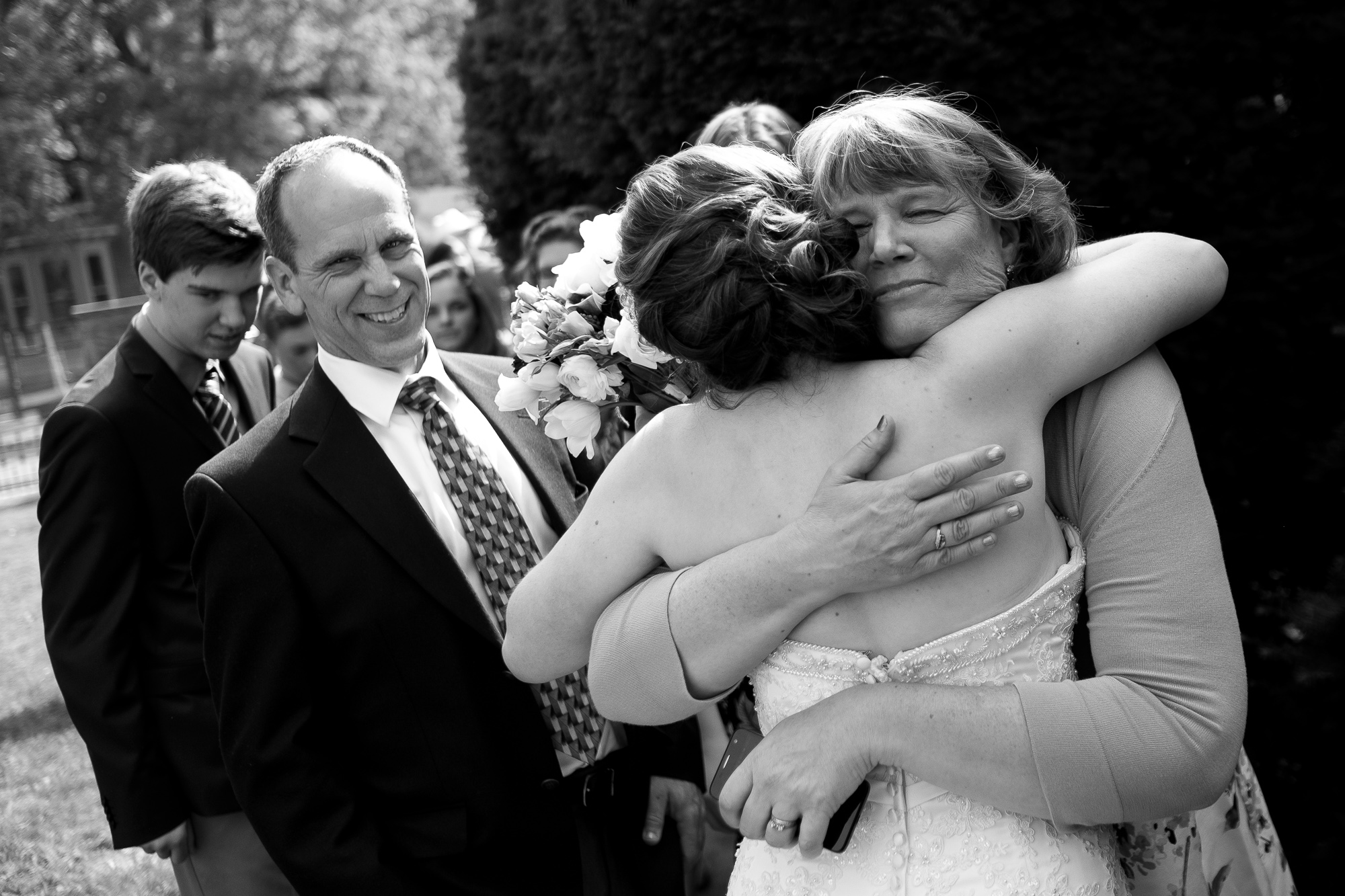 Jennifer greets friends and family after their wedding ceremony.
