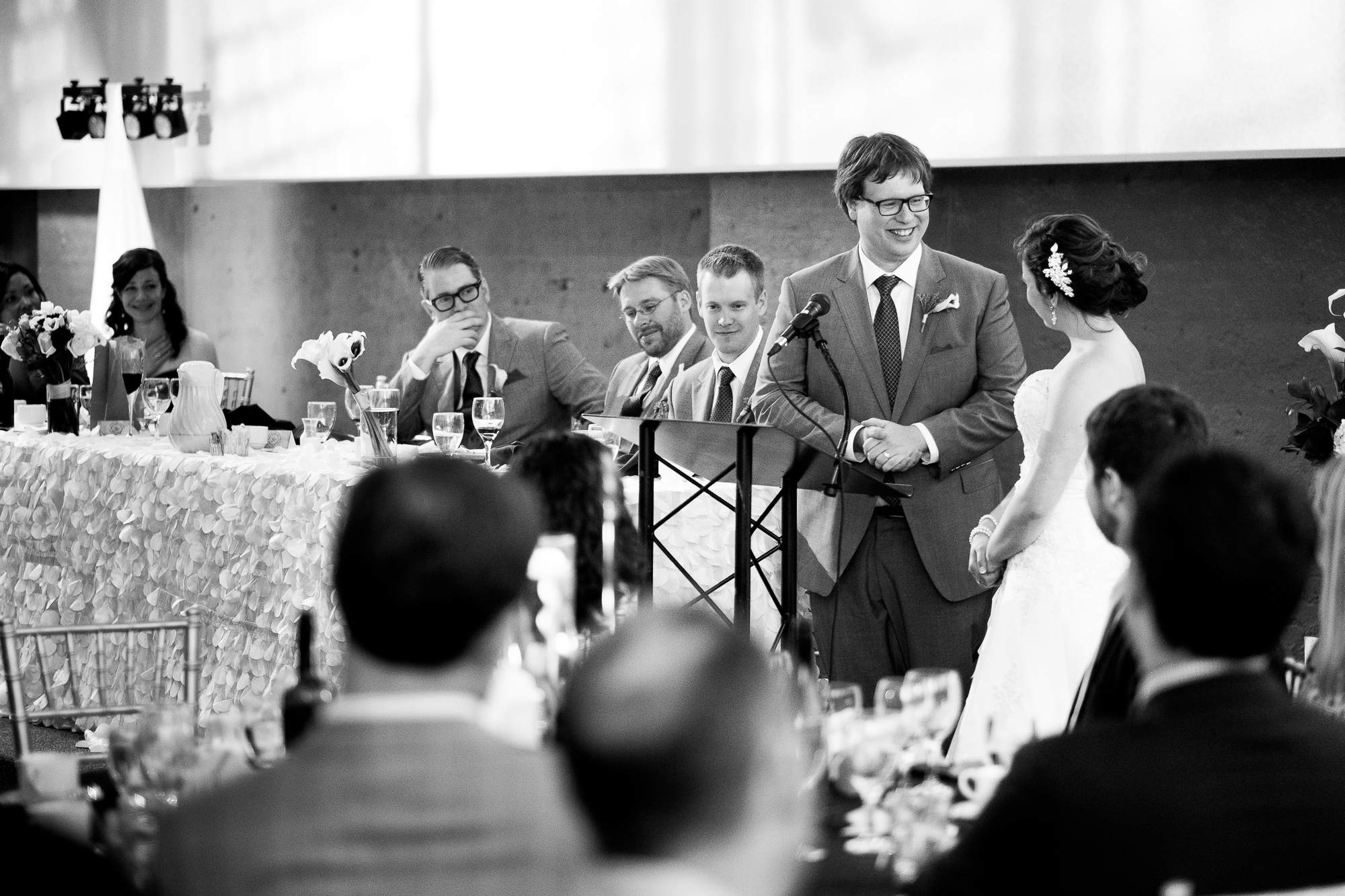 During the wedding reception, Ian toasts his new bride in his speech.