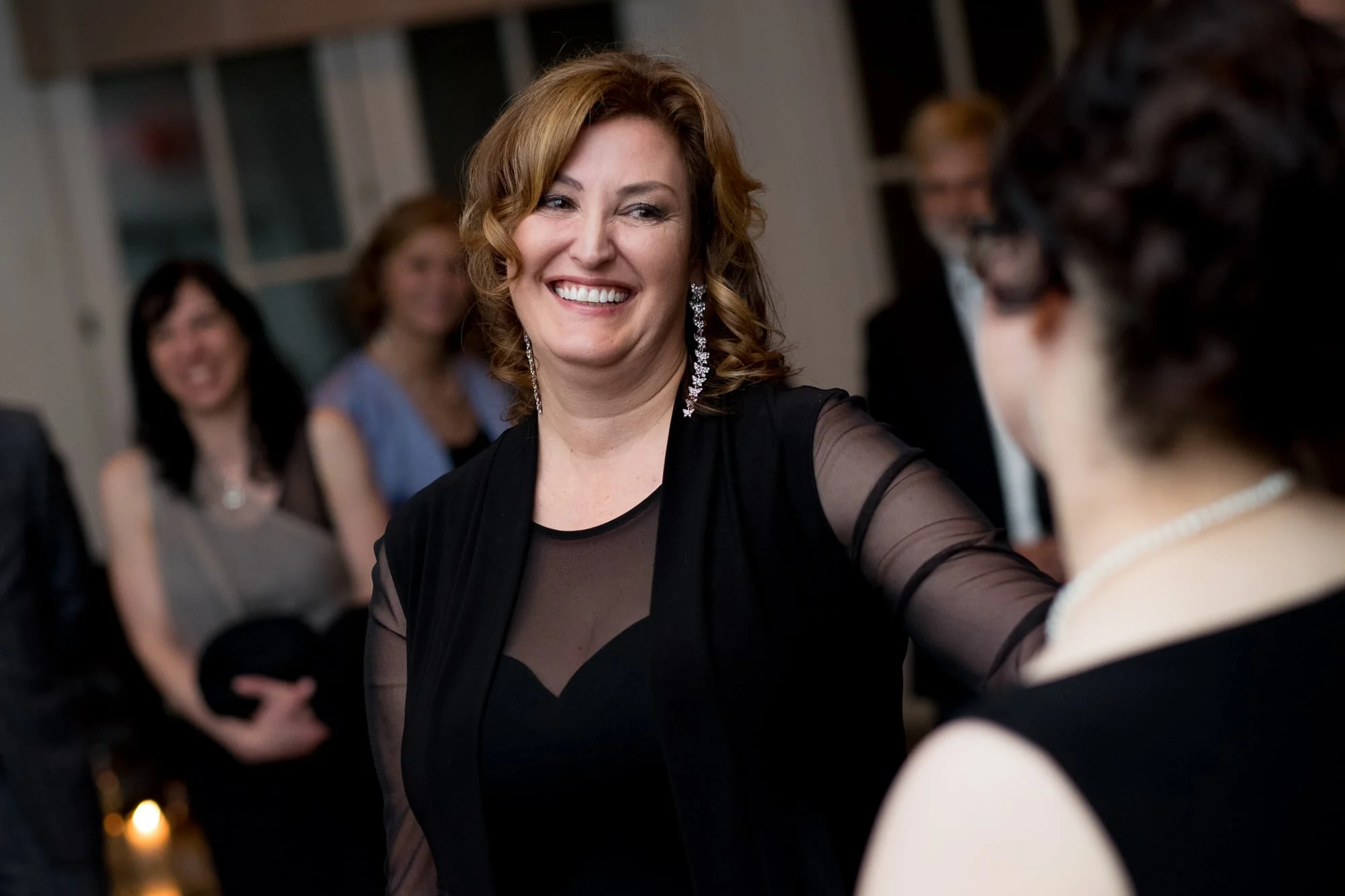 Renee + Senem exchange vows during their wedding ceremony at Langdon Hall.