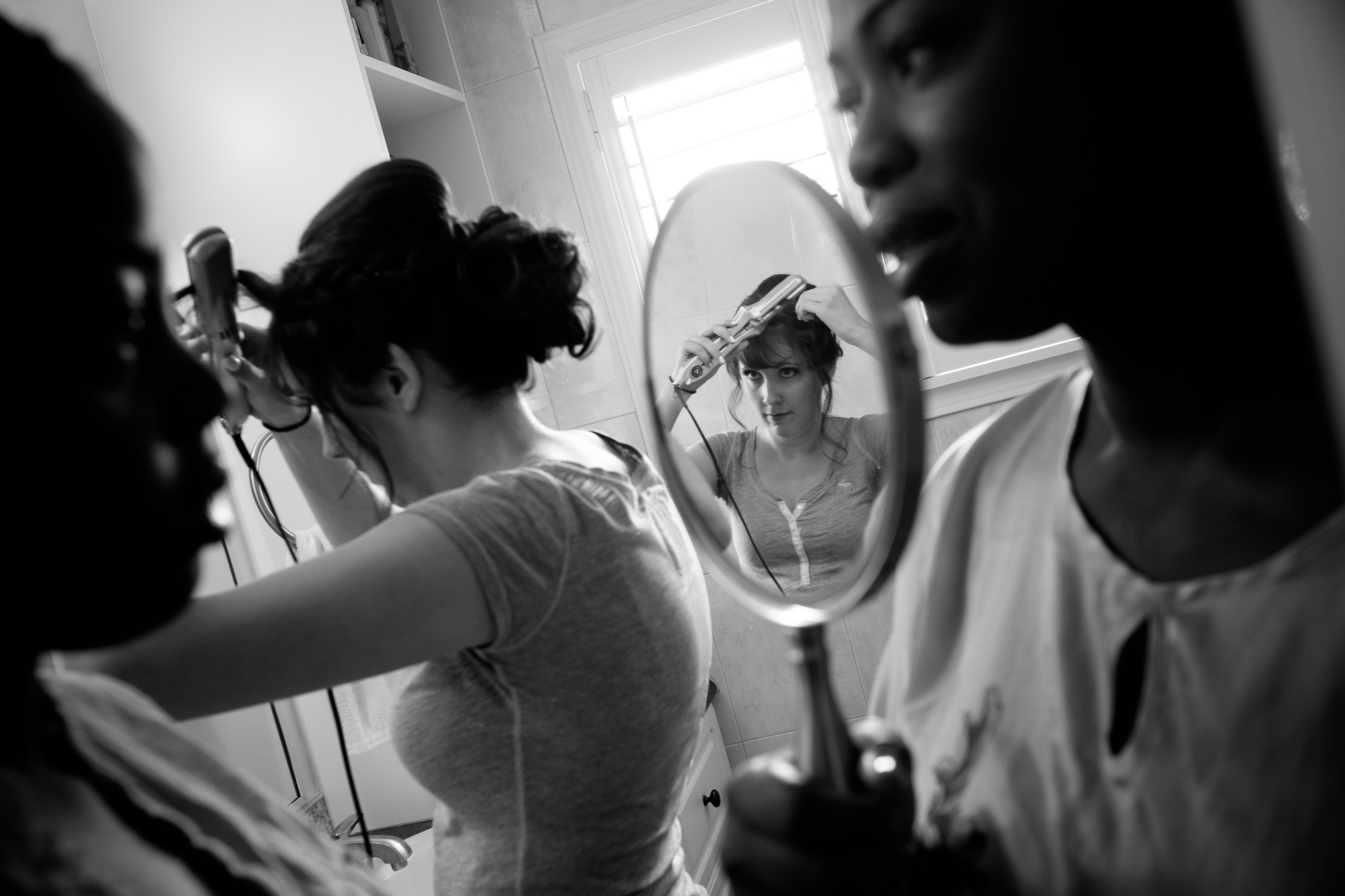 Jennifer's bridesmaids get ready at her parents house before their Toronto wedding. 