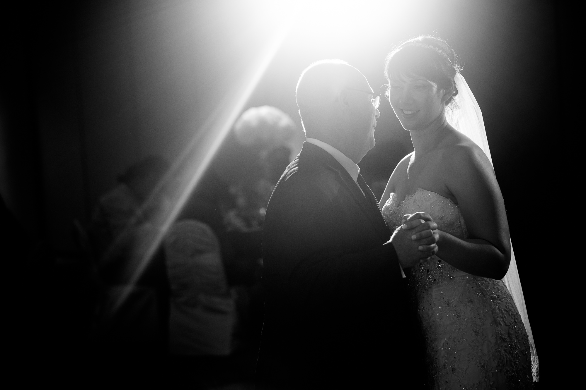 Jennifer enjoys a dance with her father during their wedding reception in Toronto. 