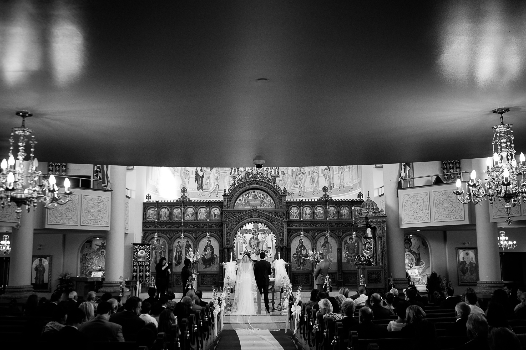  A photograph during their wedding ceremony at a Greek Orthodox Church. 