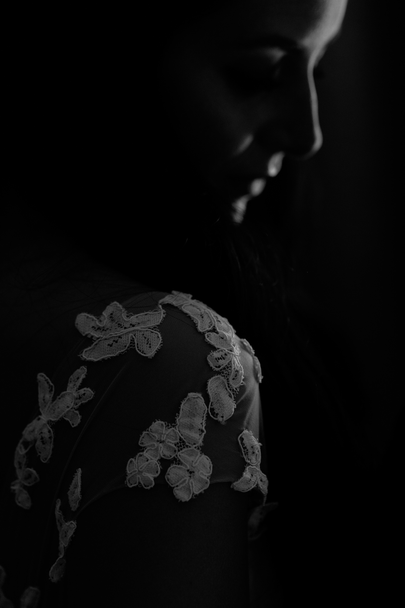  A black and white portrait of Danni in her wedding dress in her suite at the Shangri-La Hotel before her wedding ceremony at the Fermenting Cellar in Toronto's Distillery district. 