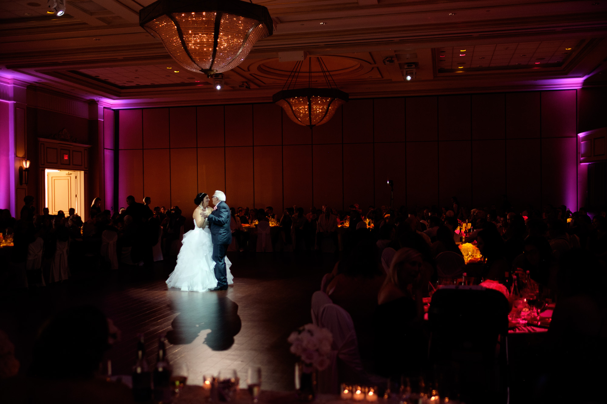 Melanie and her father share a dance during the wedding reception at the Toscana hall in Toronto. 