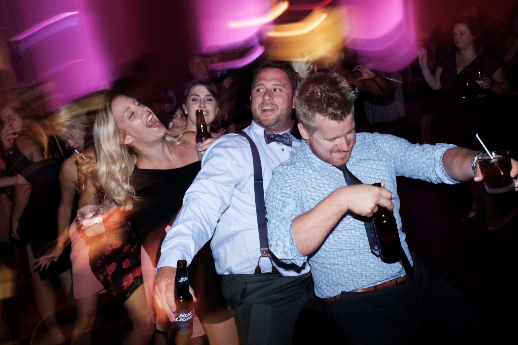 Guests enjoy the party and the dance floor at Melanie & David's wedding reception at the Toscana in Toronto. 