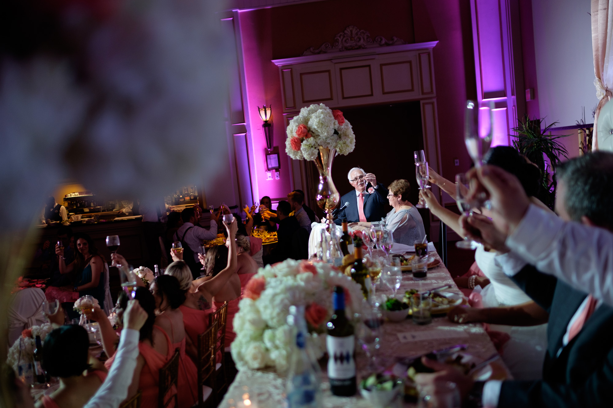  The bride's parents offer a toast to the newlywed couple during their wedding reception at the Toscana hall in Toronto. 