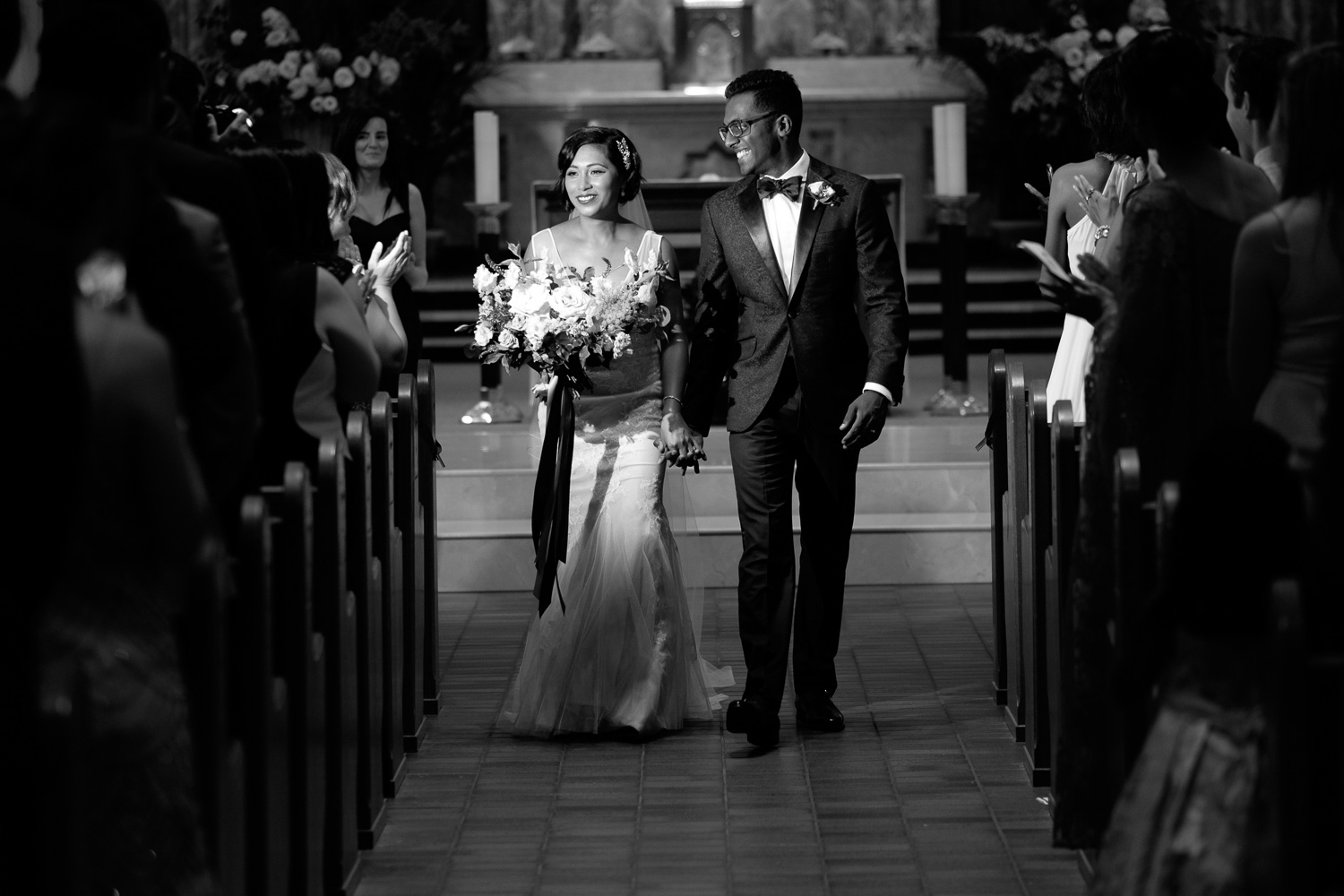  Najwa + Trevin walk down the aisle after their wedding ceremony in Toronto.&nbsp; 