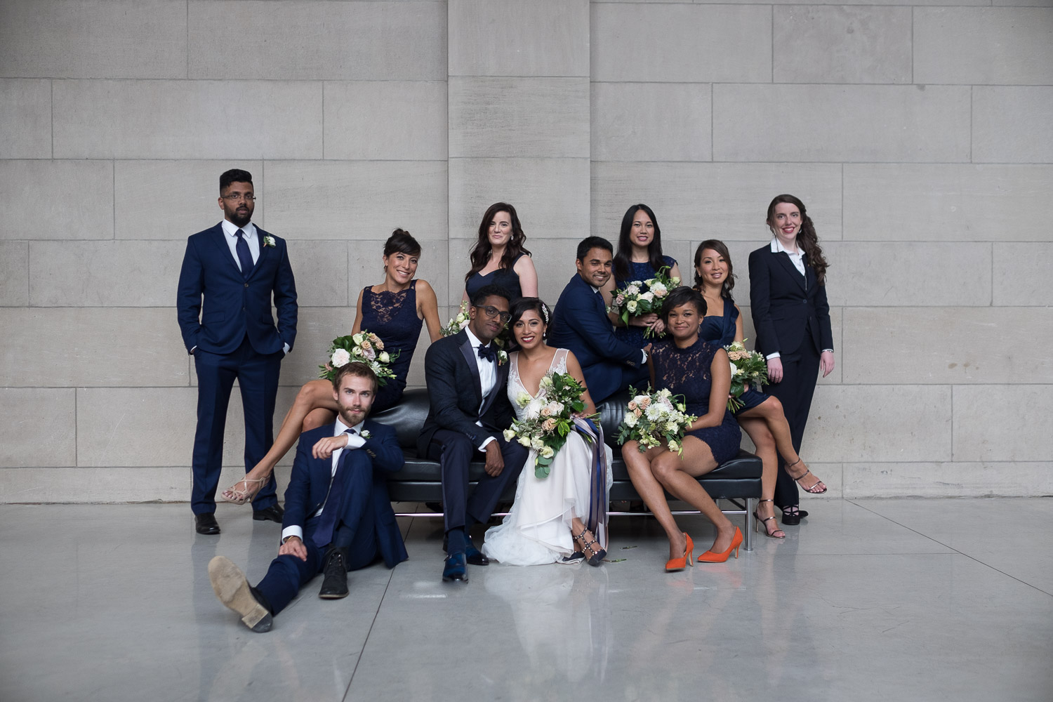  A portait of the wedding party from Najwa + Trevin's wedding at the Art Gallery of Ontario in Toronto.&nbsp; 