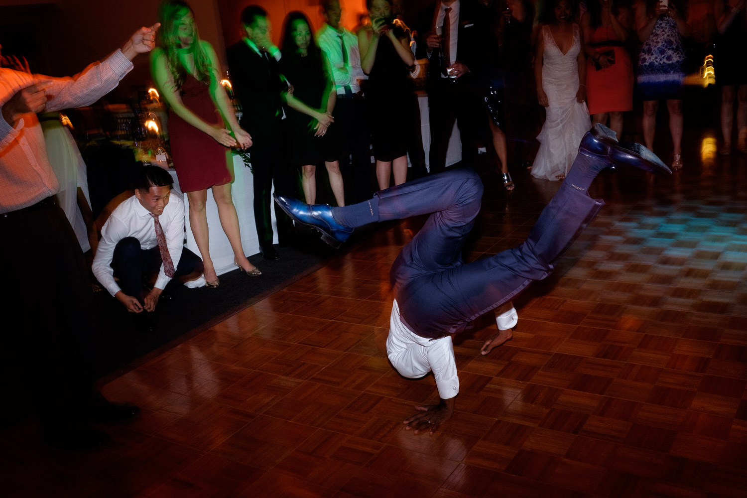  The groom does some breakdancing on the dance floor during his wedding reception at the Art Gallery of Ontario in Toronto.&nbsp; 