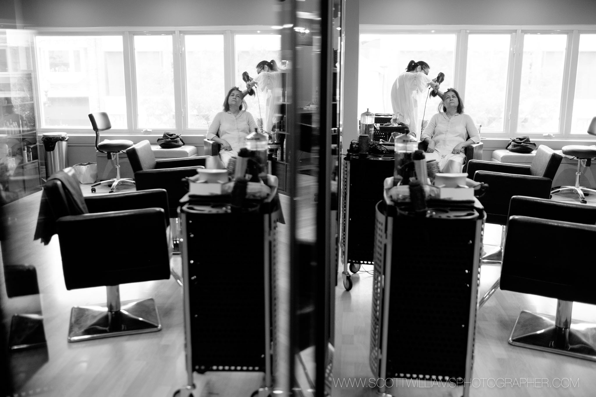  The bride gets her hair and make up done at the salon before her wedding at the Ancaster Mill in Ancaster, Ontario. 