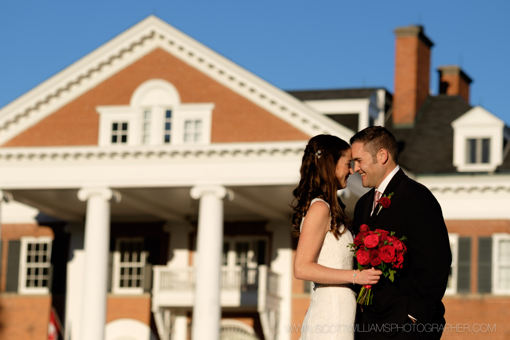 A wedding portrait taken at sunset in front of Langdon Hall in Cambridge, Ontario. 