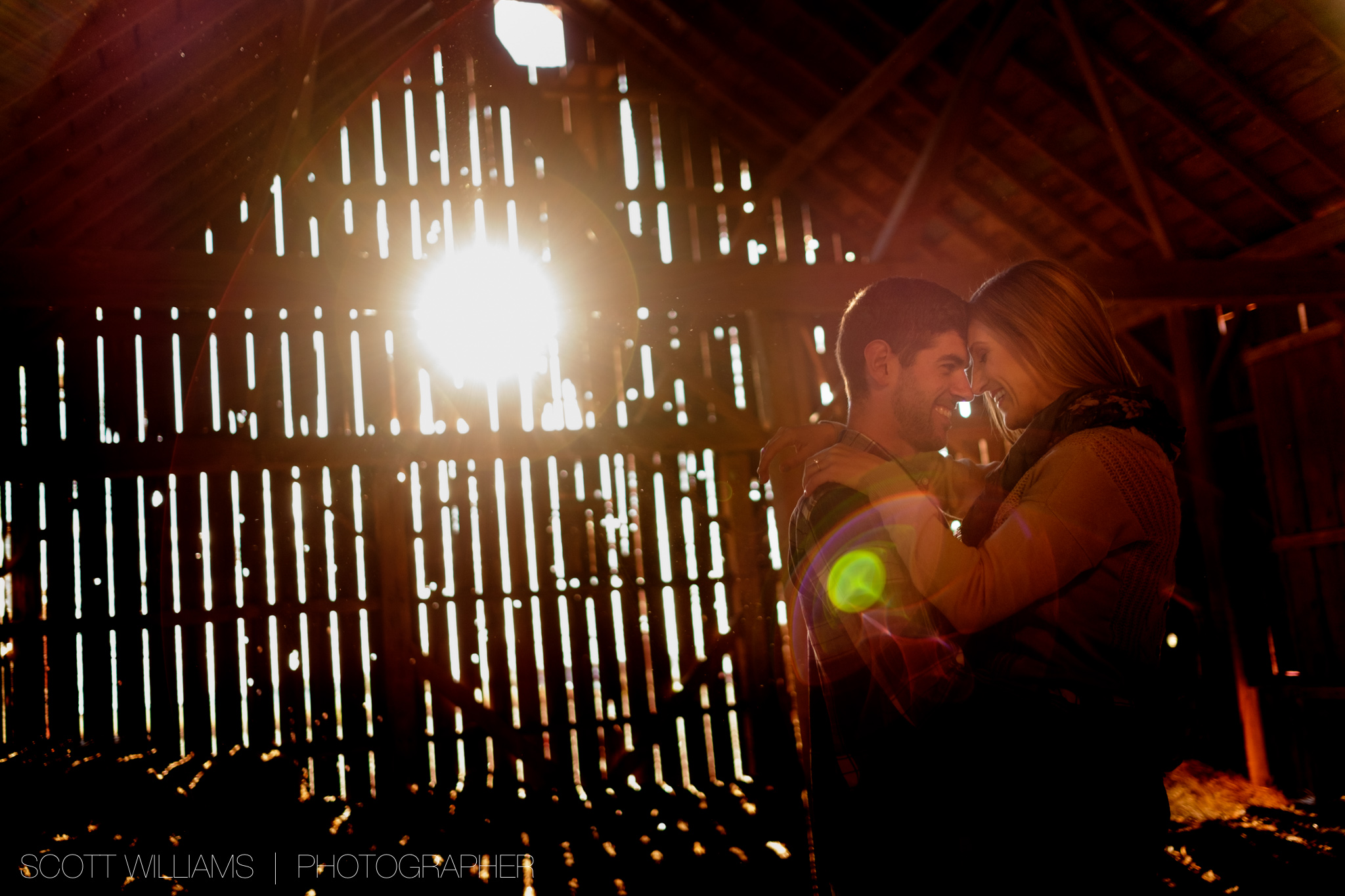  A photograph from Sabrina + Zach's sunset engagement session on a farm in Southwestern Ontario. 