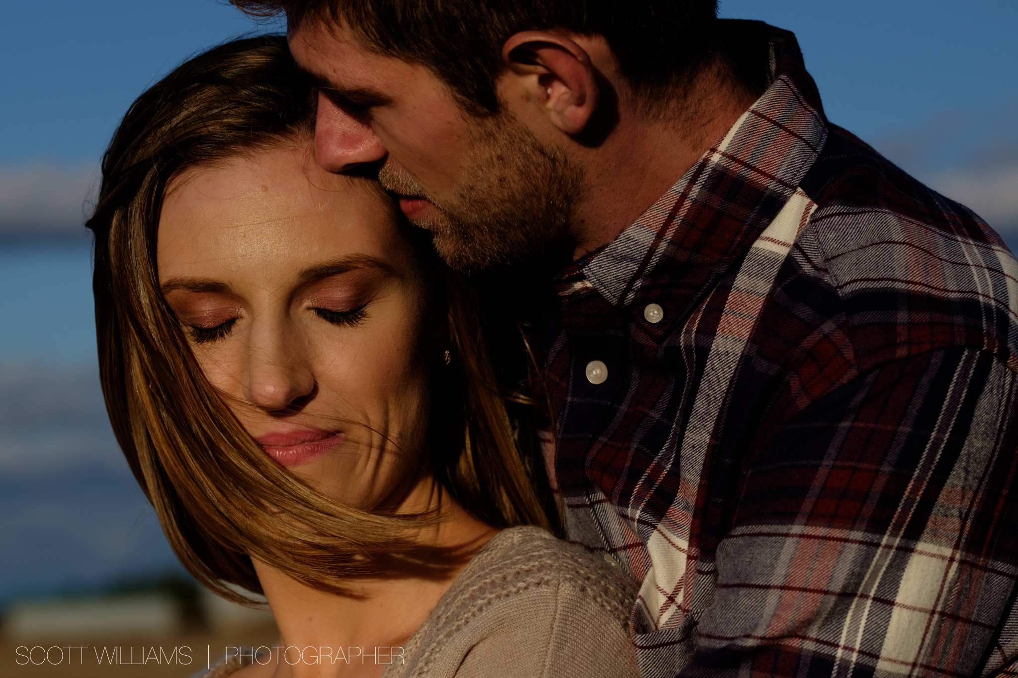  A photograph from Sabrina + Zach's sunset engagement session on a farm in Southwestern Ontario. 