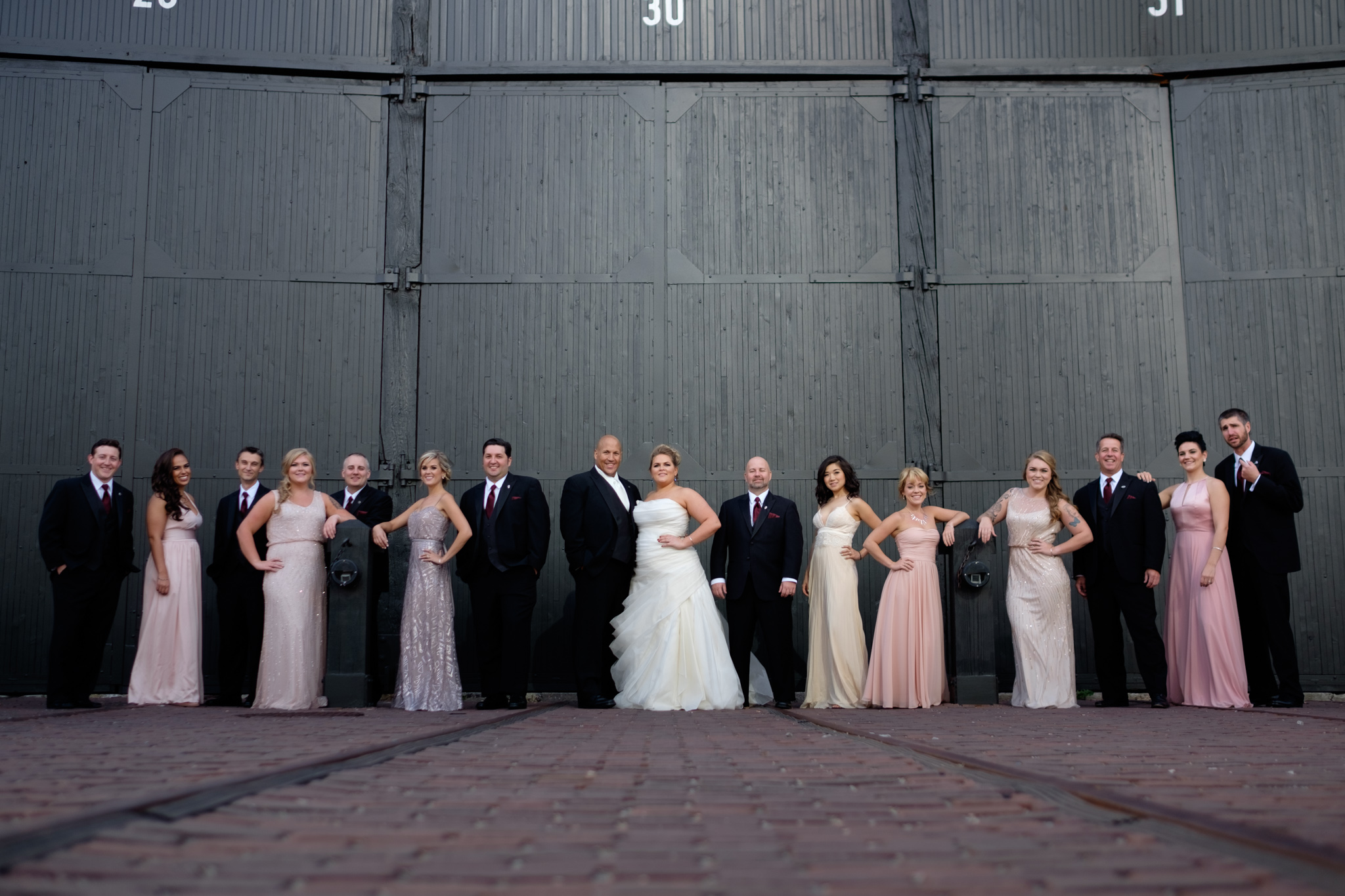  A photograph of the wedding party from Savannah + Bernie's wedding at the SteamWhistle Brewery in downtown Toronto.&nbsp; 