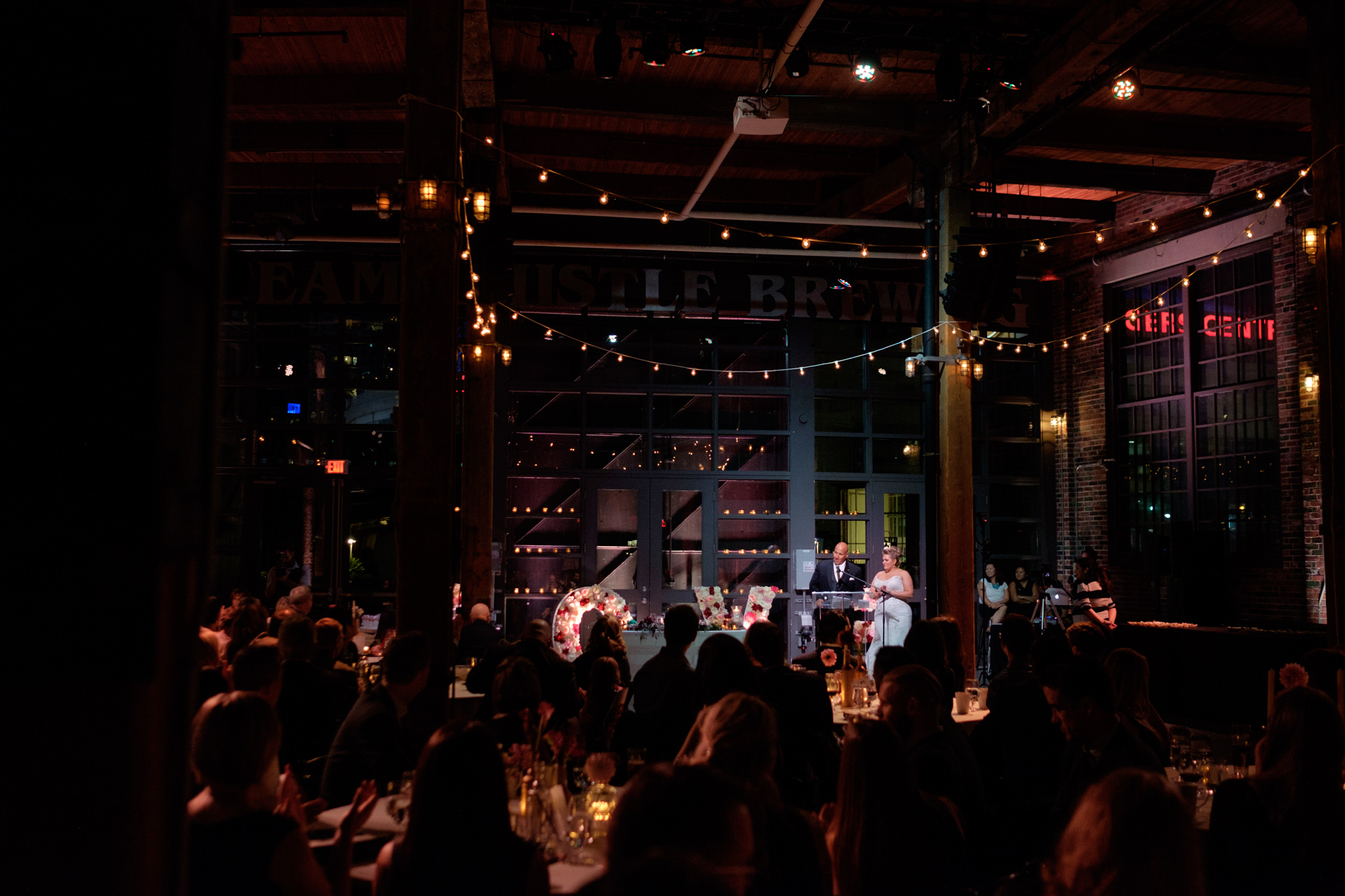  The bride and groom give their wedding speech to their guests during their reception at the SteamWhistle Brewery in Toronto.&nbsp; 