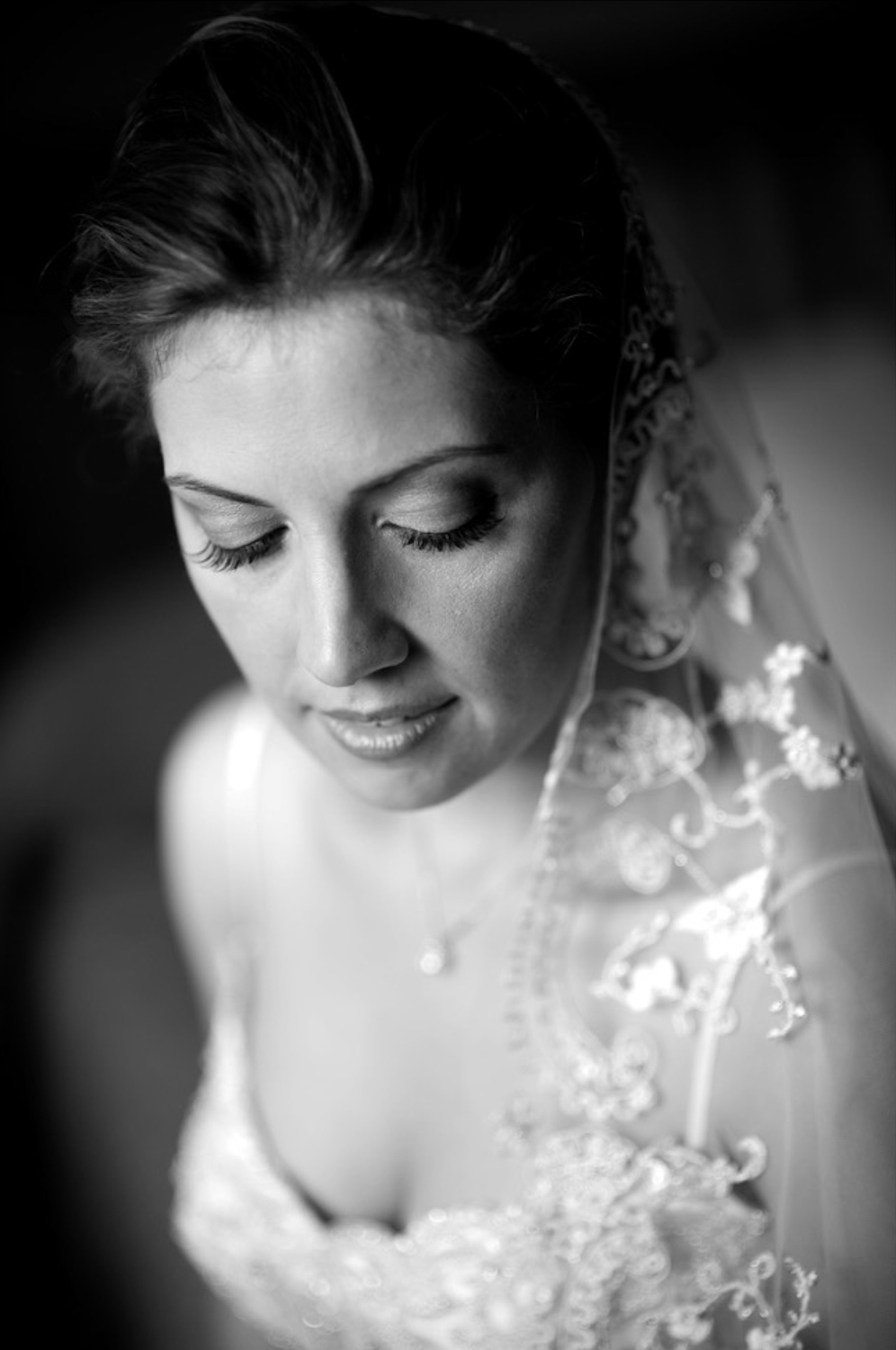  A natural light portrait of a bride before her Greek Orthodox wedding in London, Ontario. 