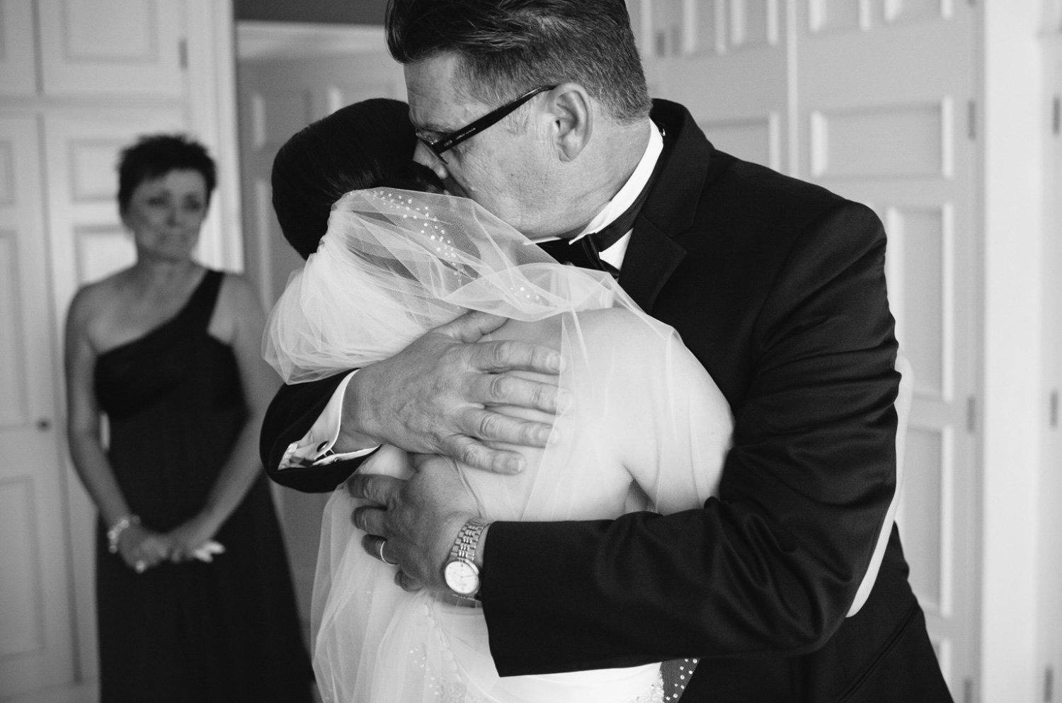 Grayson-Hall-Wedding-bride-hugged-by-father