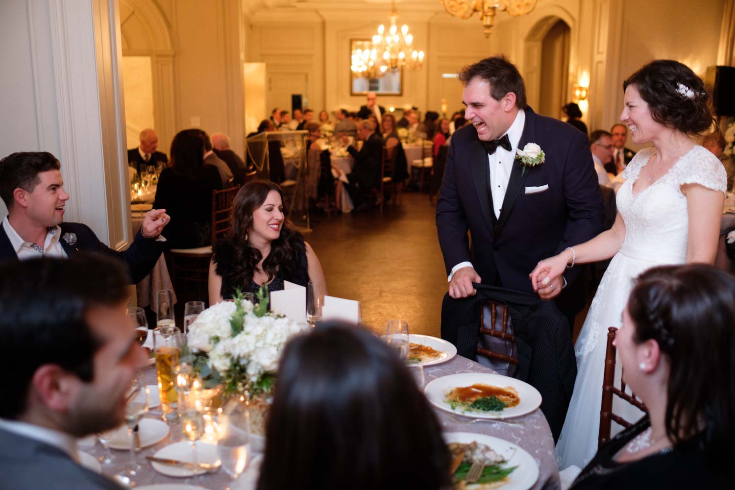  Newlywed couple greets their guests during the reception at their wedding at Graydon Hall in Toronto.&nbsp; 