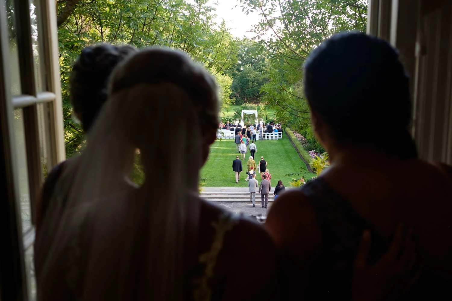 a wedding image from a sam sex wedding at Graydon Hall in Toronto. 