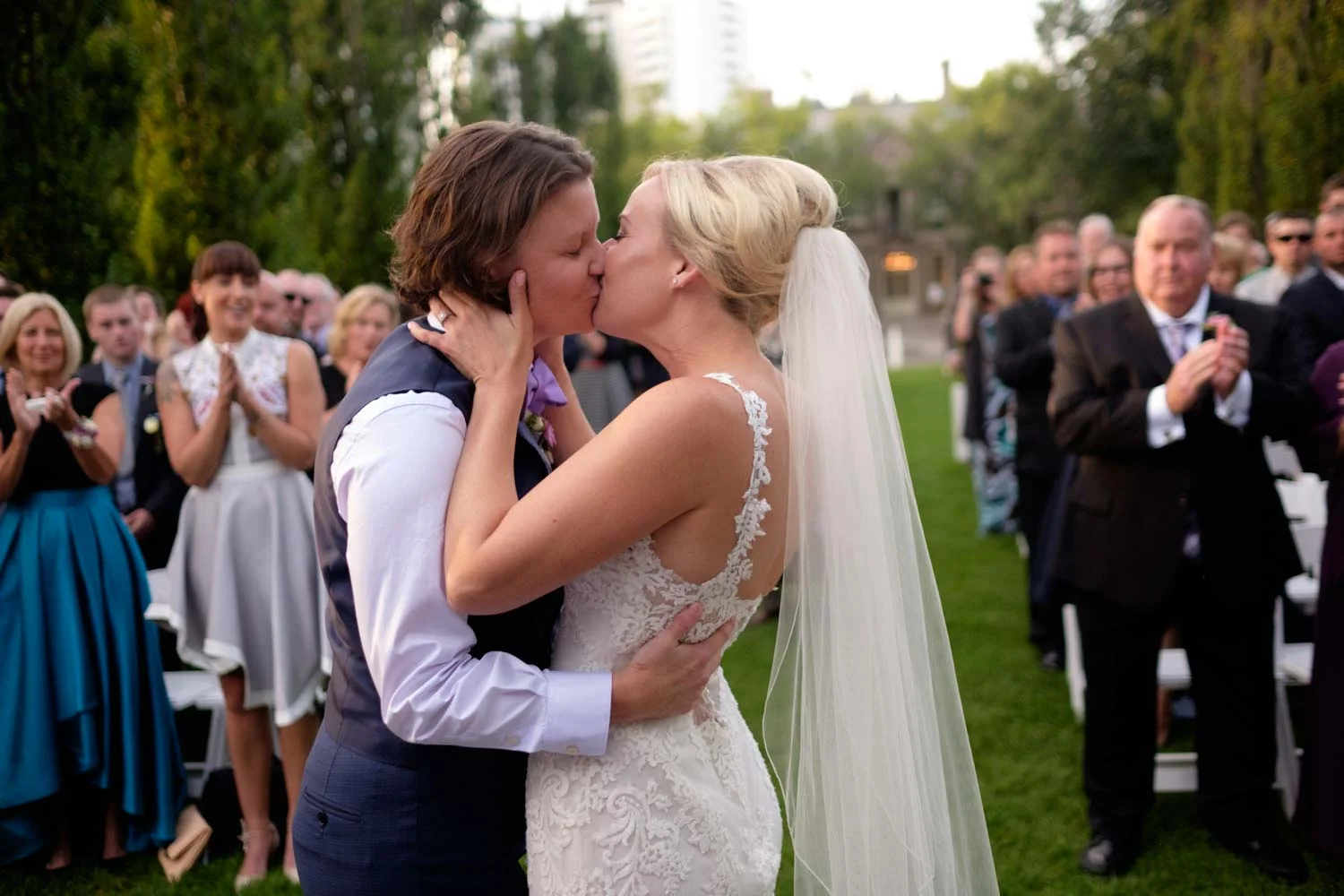 a wedding image from a sam sex wedding at Graydon Hall in Toronto. 
