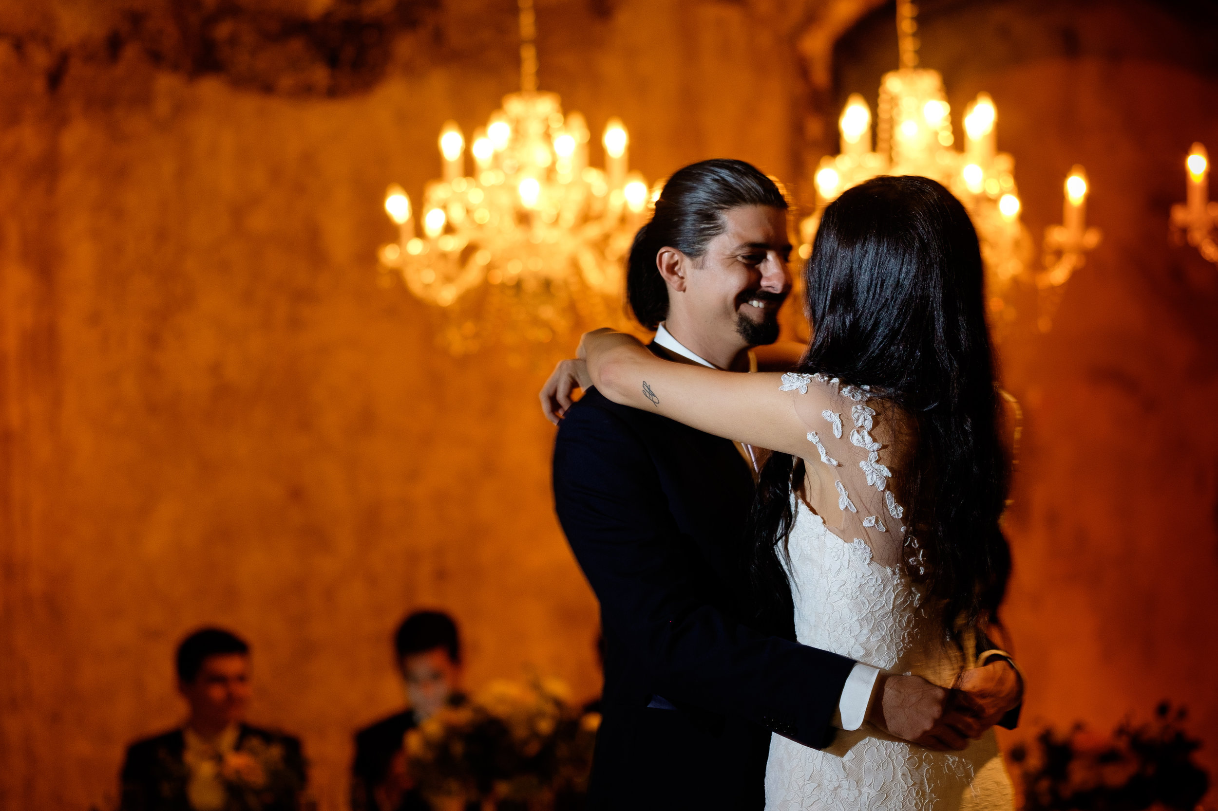  This is one of my favourite first dance images from this year, I love the contrast of the Danielle + Felipe with the warm tones in the background.  Plus, check out his expression.... that's one happy groom! 