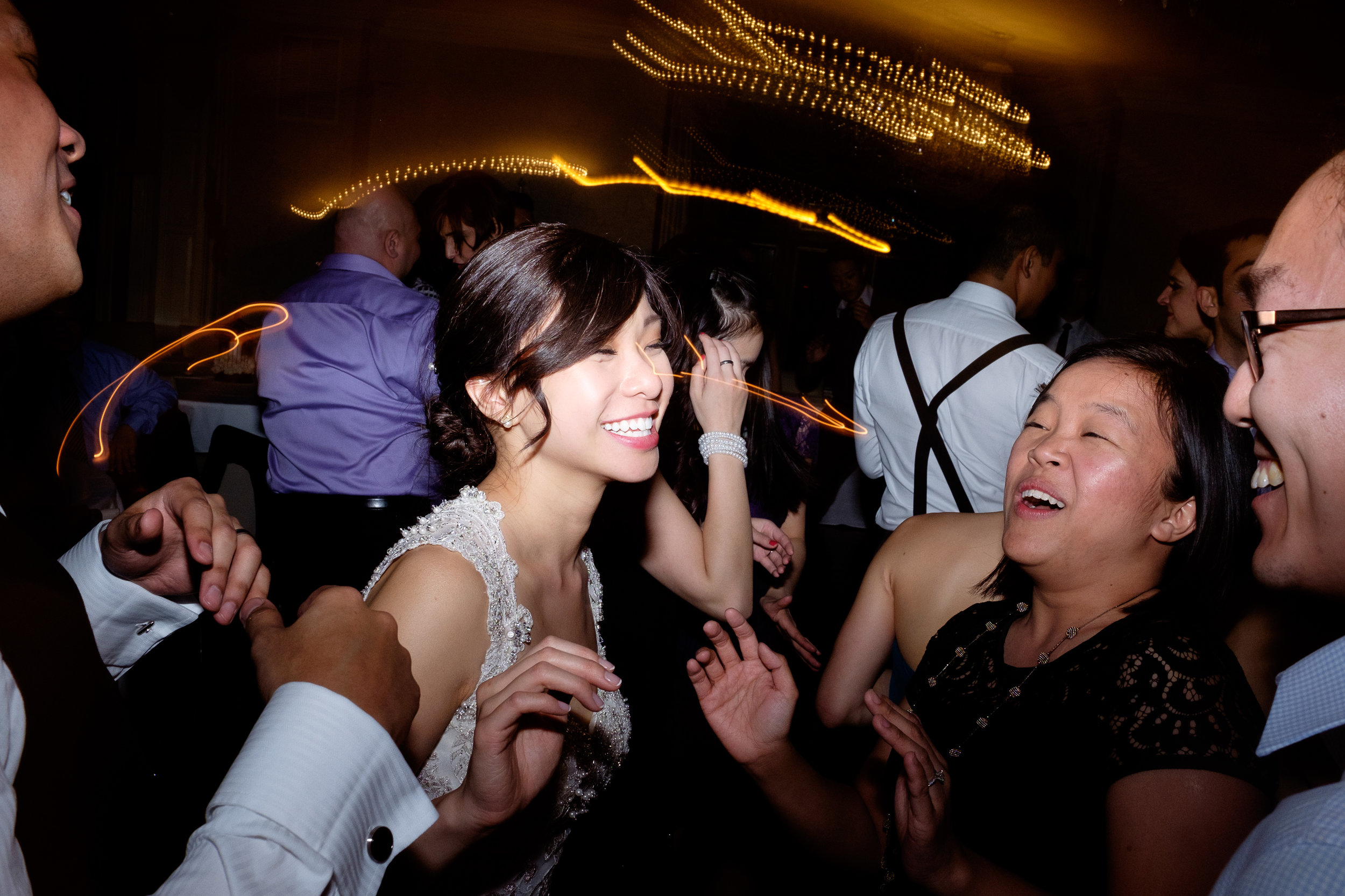  It's not much of a secret that my favourite part of the wedding is the party at the end of the night... I'm one of the few wedding photographers in Toronto that cover the entire day from start to finish.  Haidee is having an amazing time with her fr