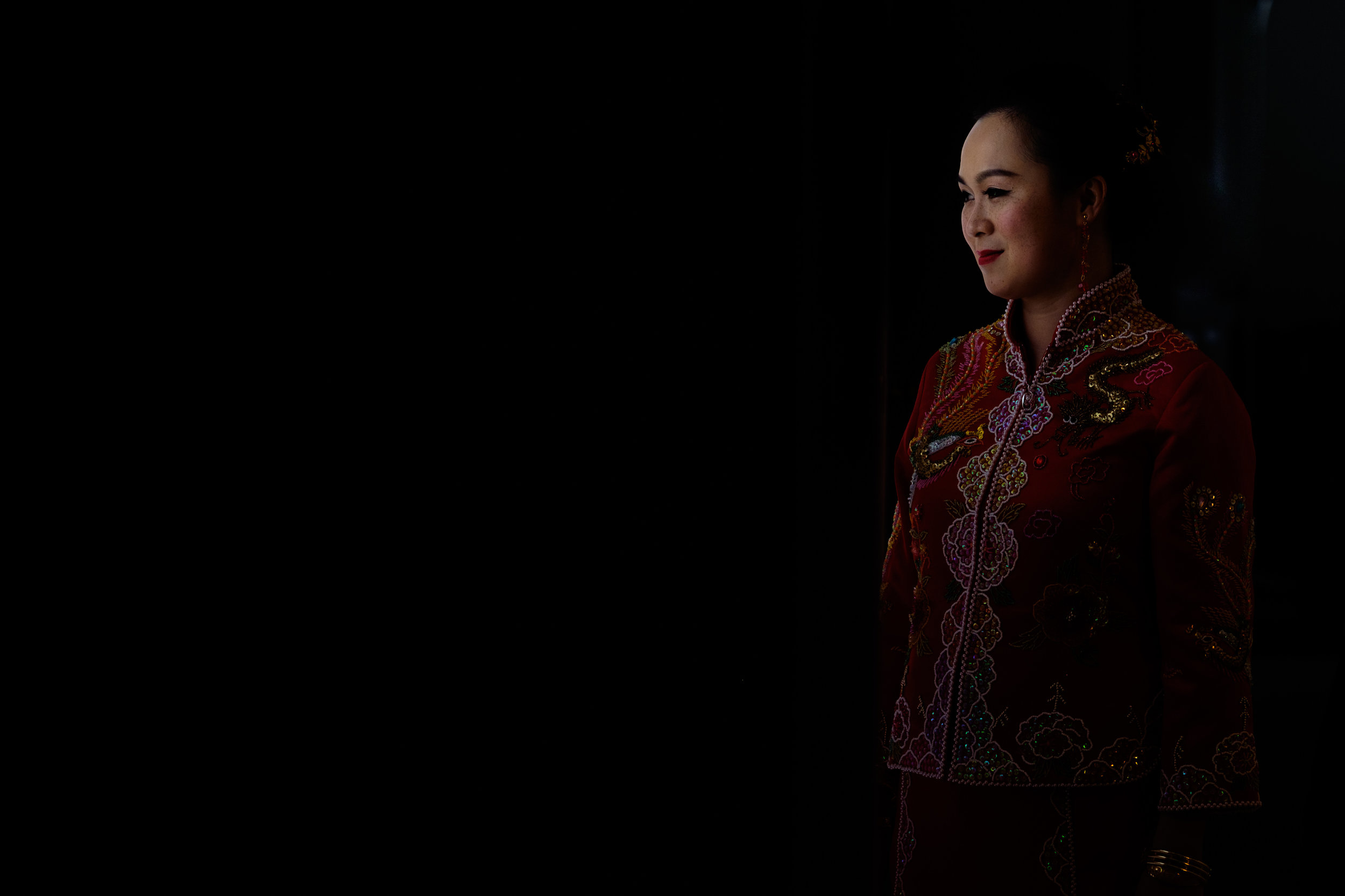  I love simple window light. &nbsp;On any wedding day you'll find me dragging people towards that beautiful soft window light but in this case Jing was already standing there and I grabbed a quick candid portrait of her before their Chinese tea cerem