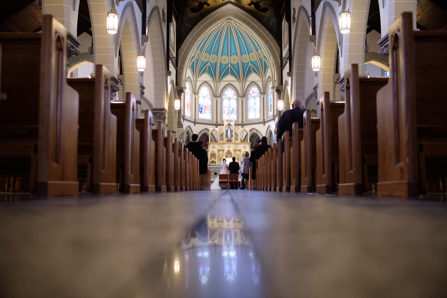  I'm always looking for a different angle, especially during wedding ceremonies.&nbsp;  Sometimes you have to get right down on the floor for that different angle. &nbsp; This one is from Jenny + John's Catholic wedding in Toronto. 