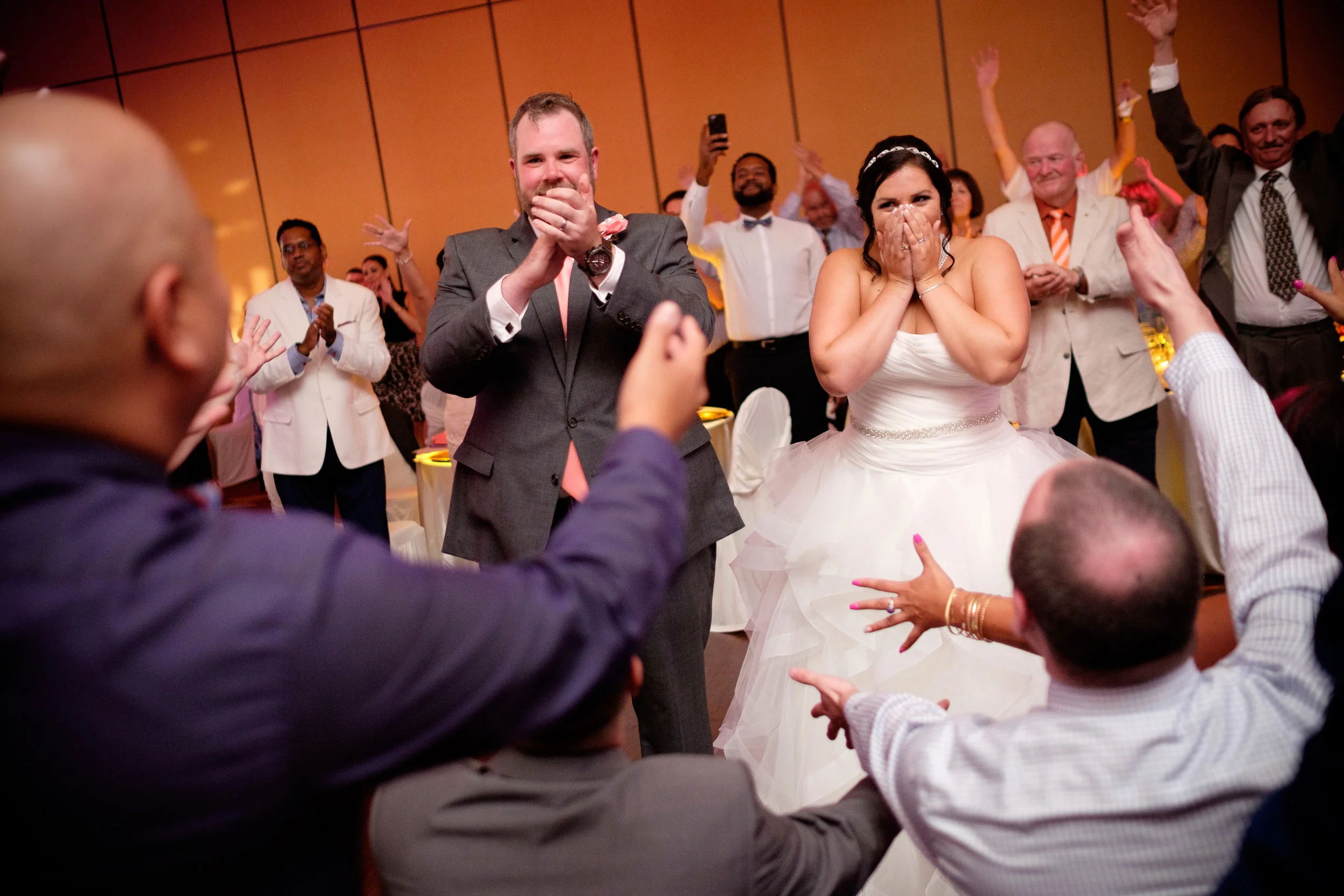  The bride and groom are surprised with a flash mob from their wedding guests during their Toronto wedding reception. 