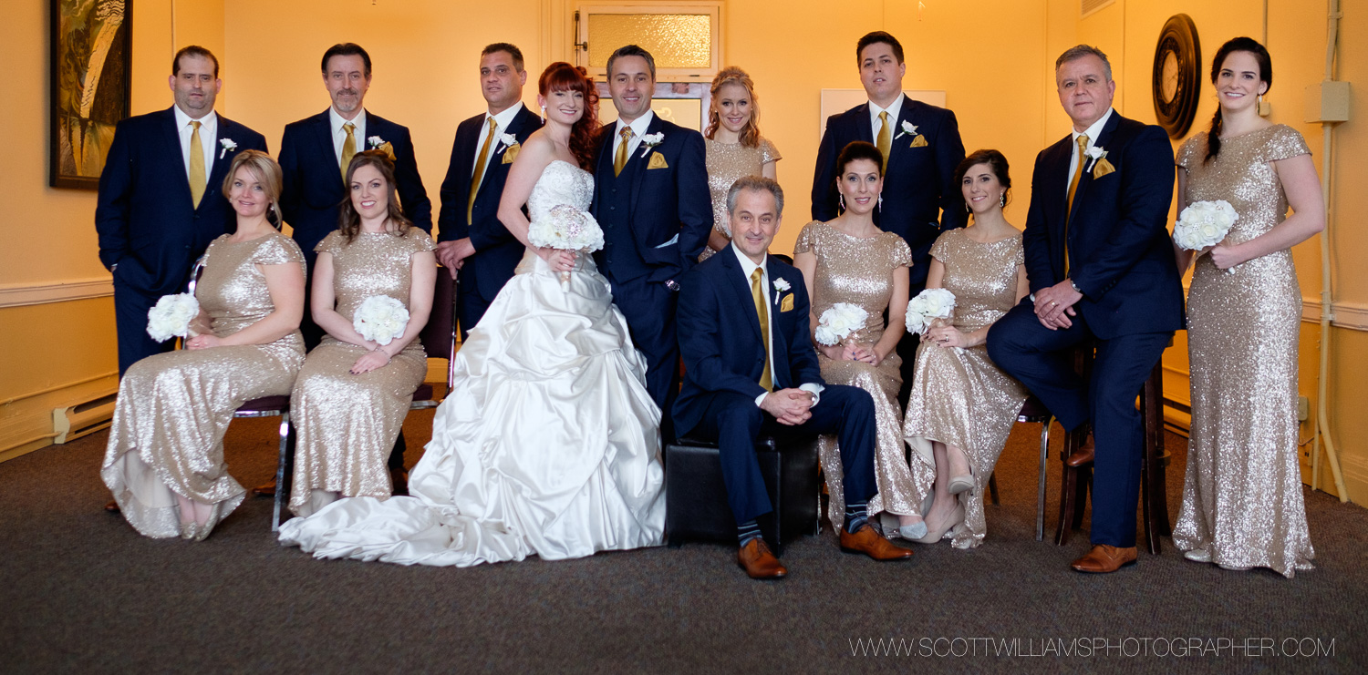  The bridal party poses for a formal portrait at the Capitol Theatre in North Bay, Ontario&nbsp; 