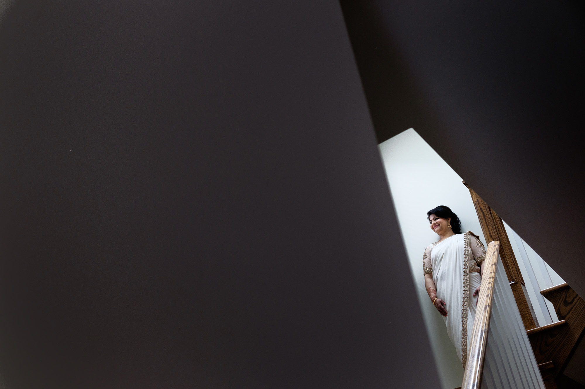  Noor poses for a bridal portait in her families home before her wedding at the Toronto Reference Library.&nbsp; 