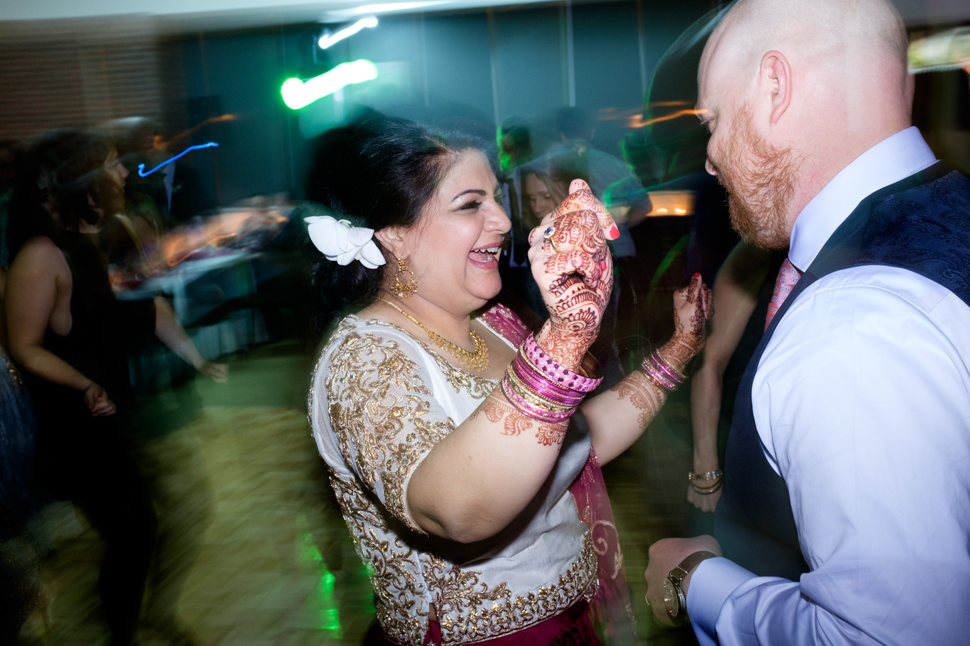  Noor and John party it up on the dance floor during their wedding reception at the Toronto Reference Library.&nbsp; 